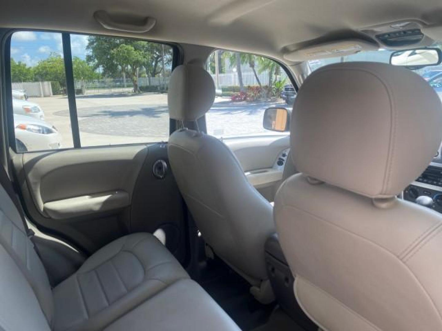 2003 Cactus Green Pearl Coat /Dark Slate Gray Jeep Liberty Limited 1 OWNER LOW MILES 71,149 (1J4GK58KX3W) with an 3.7L V6 Engine engine, Automatic transmission, located at 4701 North Dixie Hwy, Pompano Beach, FL, 33064, (954) 422-2889, 26.240938, -80.123474 - OUR WEBPAGE FLORIDACARS1.COM HAS OVER 100 PHOTOS AND FREE CARFAX LINK 2003 JEEP LIBERTY LIMITED VIN: 1J4GK58KX3W598220 1 J 4 G K 5 8 K X 3 W 5 9 8 2 2 0 4 DOOR WAGON/SPORT UTILITY 3.7L V6 F GASOLINE REAR WHEEL DRIVE Top Features Alloy Wheels Leather Seats Tow Hitch Basic Features AM/FM Stereo Air Co - Photo#95
