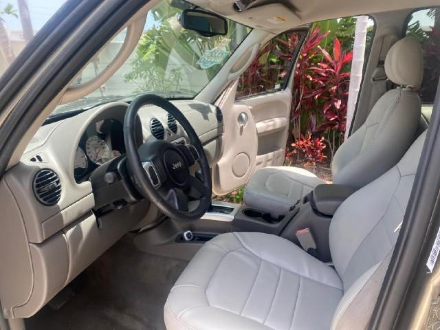 2003 Cactus Green Pearl Coat /Dark Slate Gray Jeep Liberty Limited 1 OWNER LOW MILES 71,149 (1J4GK58KX3W) with an 3.7L V6 Engine engine, Automatic transmission, located at 4701 North Dixie Hwy, Pompano Beach, FL, 33064, (954) 422-2889, 26.240938, -80.123474 - OUR WEBPAGE FLORIDACARS1.COM HAS OVER 100 PHOTOS AND FREE CARFAX LINK 2003 JEEP LIBERTY LIMITED VIN: 1J4GK58KX3W598220 1 J 4 G K 5 8 K X 3 W 5 9 8 2 2 0 4 DOOR WAGON/SPORT UTILITY 3.7L V6 F GASOLINE REAR WHEEL DRIVE Top Features Alloy Wheels Leather Seats Tow Hitch Basic Features AM/FM Stereo Air Co - Photo#36