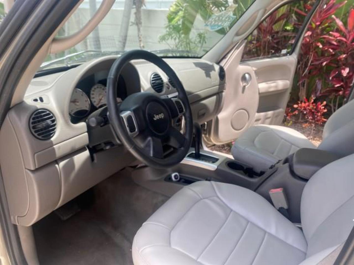 2003 Cactus Green Pearl Coat /Dark Slate Gray Jeep Liberty Limited 1 OWNER LOW MILES 71,149 (1J4GK58KX3W) with an 3.7L V6 Engine engine, Automatic transmission, located at 4701 North Dixie Hwy, Pompano Beach, FL, 33064, (954) 422-2889, 26.240938, -80.123474 - OUR WEBPAGE FLORIDACARS1.COM HAS OVER 100 PHOTOS AND FREE CARFAX LINK 2003 JEEP LIBERTY LIMITED VIN: 1J4GK58KX3W598220 1 J 4 G K 5 8 K X 3 W 5 9 8 2 2 0 4 DOOR WAGON/SPORT UTILITY 3.7L V6 F GASOLINE REAR WHEEL DRIVE Top Features Alloy Wheels Leather Seats Tow Hitch Basic Features AM/FM Stereo Air Co - Photo#37