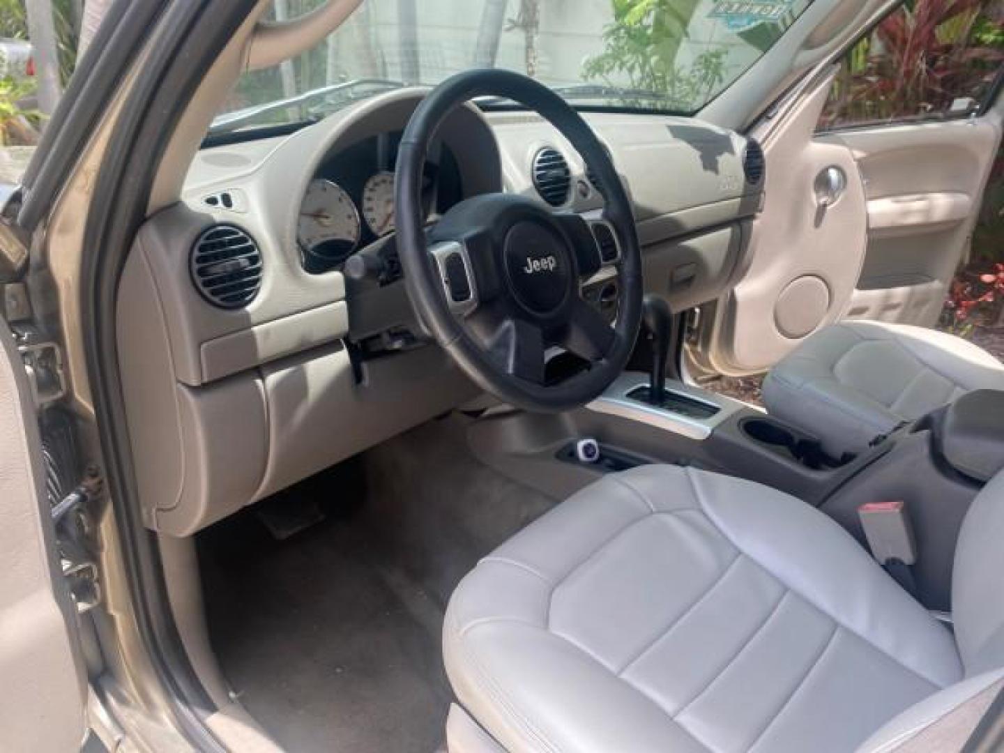 2003 Cactus Green Pearl Coat /Dark Slate Gray Jeep Liberty Limited 1 OWNER LOW MILES 71,149 (1J4GK58KX3W) with an 3.7L V6 Engine engine, Automatic transmission, located at 4701 North Dixie Hwy, Pompano Beach, FL, 33064, (954) 422-2889, 26.240938, -80.123474 - OUR WEBPAGE FLORIDACARS1.COM HAS OVER 100 PHOTOS AND FREE CARFAX LINK 2003 JEEP LIBERTY LIMITED VIN: 1J4GK58KX3W598220 1 J 4 G K 5 8 K X 3 W 5 9 8 2 2 0 4 DOOR WAGON/SPORT UTILITY 3.7L V6 F GASOLINE REAR WHEEL DRIVE Top Features Alloy Wheels Leather Seats Tow Hitch Basic Features AM/FM Stereo Air Co - Photo#38