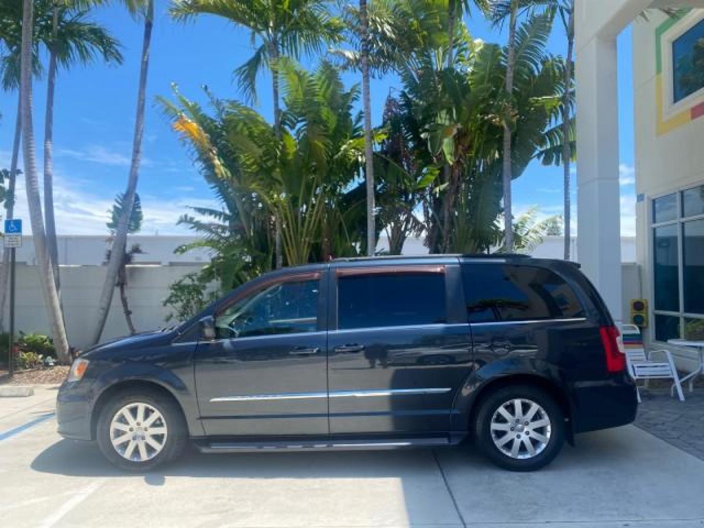 2014 Brilliant Black Crystal Pearlcoa /Dk Frost Beige/Med Beige Chrysler Town and Country Touring 1 OWNER LOW MILES 65,691 (2C4RC1BG1ER) with an 3.6L V6 Cylinder Engine engine, Automatic transmission, located at 4701 North Dixie Hwy, Pompano Beach, FL, 33064, (954) 422-2889, 26.240938, -80.123474 - OUR WEBPAGE FLORIDACARS1.COM HAS OVER 100 PHOTOS AND FREE CARFAX LINK 2014 CHRYSLER TOWN AND COUNTRY TOURING VIN: 2C4RC1BG1ER374547 2 C 4 R C 1 B G 1 E R 3 7 4 5 4 7 VAN 3.6L V6 F DOHC 24V GASOLINE FRONT WHEEL DRIVE Top Features Alloy Wheels Anniversary Edition Blind Spot Monitor Bluetooth Technolog - Photo#4