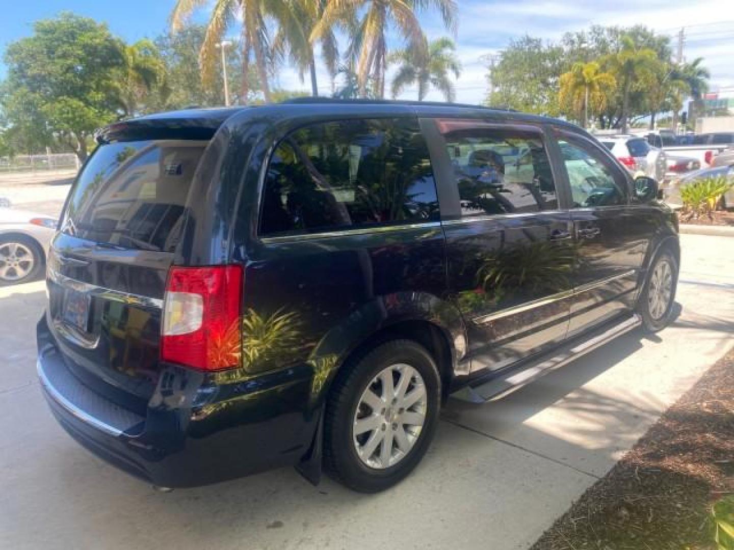 2014 Brilliant Black Crystal Pearlcoa /Dk Frost Beige/Med Beige Chrysler Town and Country Touring 1 OWNER LOW MILES 65,691 (2C4RC1BG1ER) with an 3.6L V6 Cylinder Engine engine, Automatic transmission, located at 4701 North Dixie Hwy, Pompano Beach, FL, 33064, (954) 422-2889, 26.240938, -80.123474 - OUR WEBPAGE FLORIDACARS1.COM HAS OVER 100 PHOTOS AND FREE CARFAX LINK 2014 CHRYSLER TOWN AND COUNTRY TOURING VIN: 2C4RC1BG1ER374547 2 C 4 R C 1 B G 1 E R 3 7 4 5 4 7 VAN 3.6L V6 F DOHC 24V GASOLINE FRONT WHEEL DRIVE Top Features Alloy Wheels Anniversary Edition Blind Spot Monitor Bluetooth Technolog - Photo#7