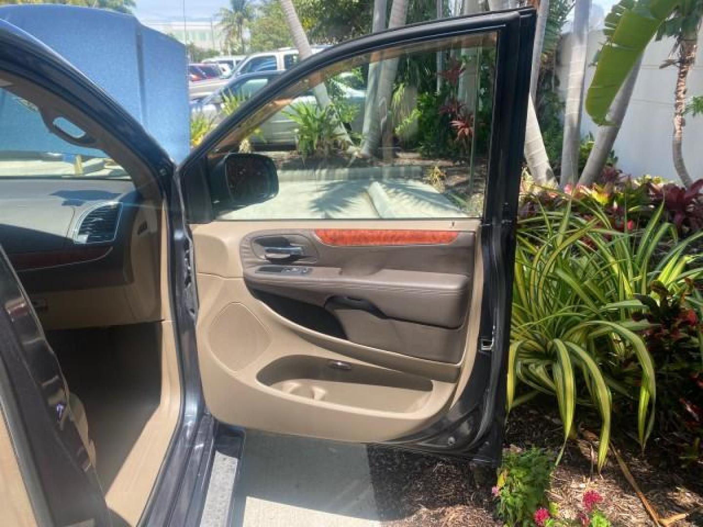 2014 Brilliant Black Crystal Pearlcoa /Dk Frost Beige/Med Beige Chrysler Town and Country Touring 1 OWNER LOW MILES 65,691 (2C4RC1BG1ER) with an 3.6L V6 Cylinder Engine engine, Automatic transmission, located at 4701 North Dixie Hwy, Pompano Beach, FL, 33064, (954) 422-2889, 26.240938, -80.123474 - OUR WEBPAGE FLORIDACARS1.COM HAS OVER 100 PHOTOS AND FREE CARFAX LINK 2014 CHRYSLER TOWN AND COUNTRY TOURING VIN: 2C4RC1BG1ER374547 2 C 4 R C 1 B G 1 E R 3 7 4 5 4 7 VAN 3.6L V6 F DOHC 24V GASOLINE FRONT WHEEL DRIVE Top Features Alloy Wheels Anniversary Edition Blind Spot Monitor Bluetooth Technolog - Photo#11