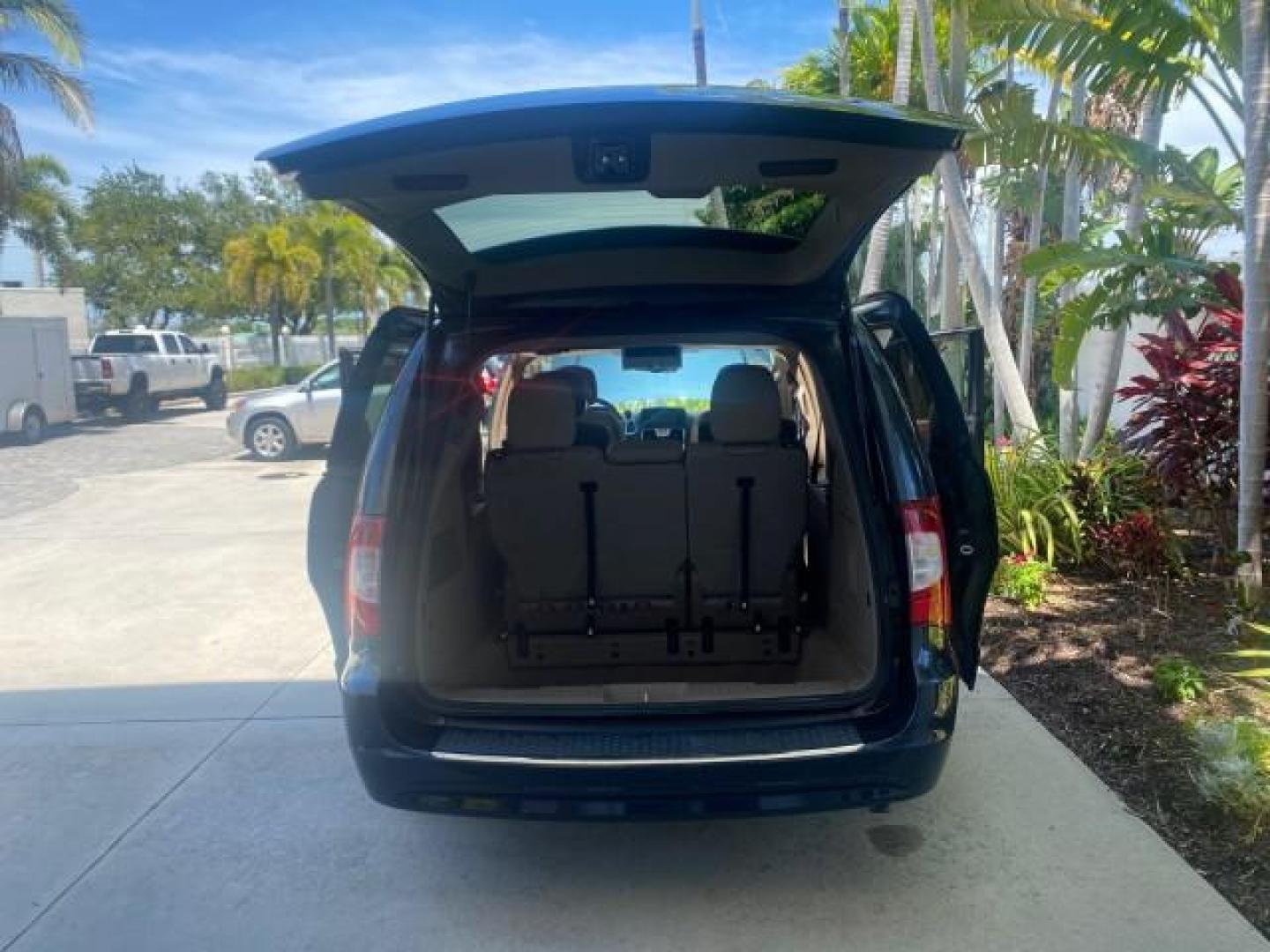 2014 Brilliant Black Crystal Pearlcoa /Dk Frost Beige/Med Beige Chrysler Town and Country Touring 1 OWNER LOW MILES 65,691 (2C4RC1BG1ER) with an 3.6L V6 Cylinder Engine engine, Automatic transmission, located at 4701 North Dixie Hwy, Pompano Beach, FL, 33064, (954) 422-2889, 26.240938, -80.123474 - OUR WEBPAGE FLORIDACARS1.COM HAS OVER 100 PHOTOS AND FREE CARFAX LINK 2014 CHRYSLER TOWN AND COUNTRY TOURING VIN: 2C4RC1BG1ER374547 2 C 4 R C 1 B G 1 E R 3 7 4 5 4 7 VAN 3.6L V6 F DOHC 24V GASOLINE FRONT WHEEL DRIVE Top Features Alloy Wheels Anniversary Edition Blind Spot Monitor Bluetooth Technolog - Photo#15