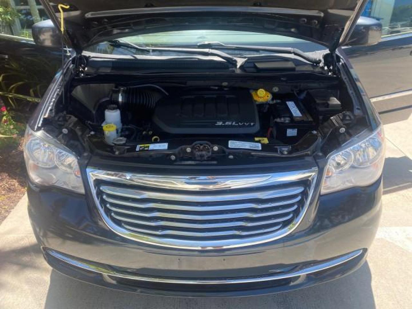 2014 Brilliant Black Crystal Pearlcoa /Dk Frost Beige/Med Beige Chrysler Town and Country Touring 1 OWNER LOW MILES 65,691 (2C4RC1BG1ER) with an 3.6L V6 Cylinder Engine engine, Automatic transmission, located at 4701 North Dixie Hwy, Pompano Beach, FL, 33064, (954) 422-2889, 26.240938, -80.123474 - OUR WEBPAGE FLORIDACARS1.COM HAS OVER 100 PHOTOS AND FREE CARFAX LINK 2014 CHRYSLER TOWN AND COUNTRY TOURING VIN: 2C4RC1BG1ER374547 2 C 4 R C 1 B G 1 E R 3 7 4 5 4 7 VAN 3.6L V6 F DOHC 24V GASOLINE FRONT WHEEL DRIVE Top Features Alloy Wheels Anniversary Edition Blind Spot Monitor Bluetooth Technolog - Photo#17