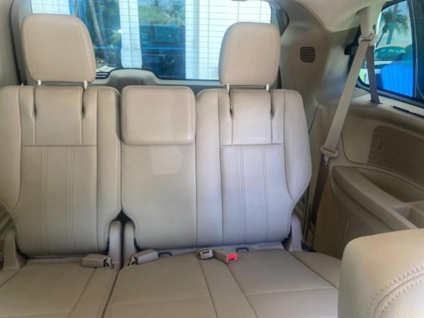 2014 Brilliant Black Crystal Pearlcoa /Dk Frost Beige/Med Beige Chrysler Town and Country Touring 1 OWNER LOW MILES 65,691 (2C4RC1BG1ER) with an 3.6L V6 Cylinder Engine engine, Automatic transmission, located at 4701 North Dixie Hwy, Pompano Beach, FL, 33064, (954) 422-2889, 26.240938, -80.123474 - OUR WEBPAGE FLORIDACARS1.COM HAS OVER 100 PHOTOS AND FREE CARFAX LINK 2014 CHRYSLER TOWN AND COUNTRY TOURING VIN: 2C4RC1BG1ER374547 2 C 4 R C 1 B G 1 E R 3 7 4 5 4 7 VAN 3.6L V6 F DOHC 24V GASOLINE FRONT WHEEL DRIVE Top Features Alloy Wheels Anniversary Edition Blind Spot Monitor Bluetooth Technolog - Photo#69