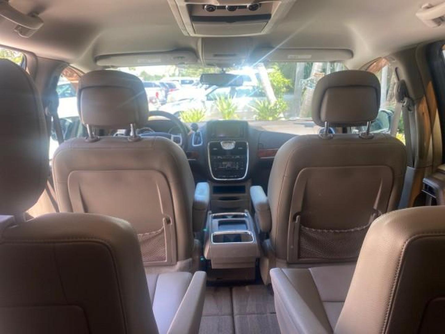 2014 Brilliant Black Crystal Pearlcoa /Dk Frost Beige/Med Beige Chrysler Town and Country Touring 1 OWNER LOW MILES 65,691 (2C4RC1BG1ER) with an 3.6L V6 Cylinder Engine engine, Automatic transmission, located at 4701 North Dixie Hwy, Pompano Beach, FL, 33064, (954) 422-2889, 26.240938, -80.123474 - OUR WEBPAGE FLORIDACARS1.COM HAS OVER 100 PHOTOS AND FREE CARFAX LINK 2014 CHRYSLER TOWN AND COUNTRY TOURING VIN: 2C4RC1BG1ER374547 2 C 4 R C 1 B G 1 E R 3 7 4 5 4 7 VAN 3.6L V6 F DOHC 24V GASOLINE FRONT WHEEL DRIVE Top Features Alloy Wheels Anniversary Edition Blind Spot Monitor Bluetooth Technolog - Photo#70