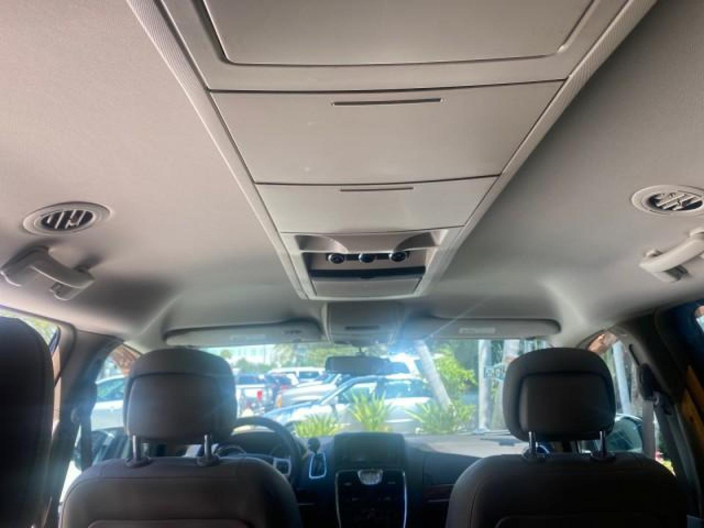2014 Brilliant Black Crystal Pearlcoa /Dk Frost Beige/Med Beige Chrysler Town and Country Touring 1 OWNER LOW MILES 65,691 (2C4RC1BG1ER) with an 3.6L V6 Cylinder Engine engine, Automatic transmission, located at 4701 North Dixie Hwy, Pompano Beach, FL, 33064, (954) 422-2889, 26.240938, -80.123474 - OUR WEBPAGE FLORIDACARS1.COM HAS OVER 100 PHOTOS AND FREE CARFAX LINK 2014 CHRYSLER TOWN AND COUNTRY TOURING VIN: 2C4RC1BG1ER374547 2 C 4 R C 1 B G 1 E R 3 7 4 5 4 7 VAN 3.6L V6 F DOHC 24V GASOLINE FRONT WHEEL DRIVE Top Features Alloy Wheels Anniversary Edition Blind Spot Monitor Bluetooth Technolog - Photo#71