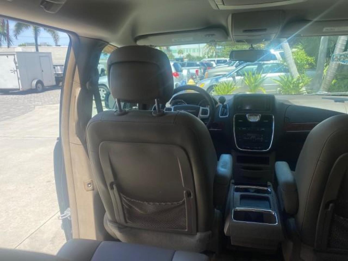 2014 Brilliant Black Crystal Pearlcoa /Dk Frost Beige/Med Beige Chrysler Town and Country Touring 1 OWNER LOW MILES 65,691 (2C4RC1BG1ER) with an 3.6L V6 Cylinder Engine engine, Automatic transmission, located at 4701 North Dixie Hwy, Pompano Beach, FL, 33064, (954) 422-2889, 26.240938, -80.123474 - OUR WEBPAGE FLORIDACARS1.COM HAS OVER 100 PHOTOS AND FREE CARFAX LINK 2014 CHRYSLER TOWN AND COUNTRY TOURING VIN: 2C4RC1BG1ER374547 2 C 4 R C 1 B G 1 E R 3 7 4 5 4 7 VAN 3.6L V6 F DOHC 24V GASOLINE FRONT WHEEL DRIVE Top Features Alloy Wheels Anniversary Edition Blind Spot Monitor Bluetooth Technolog - Photo#77