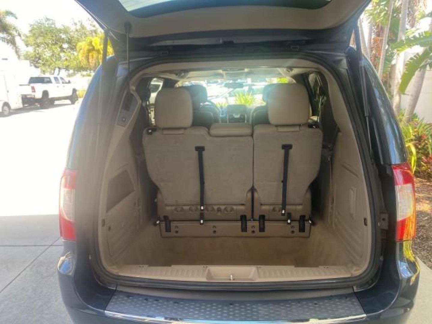 2014 Brilliant Black Crystal Pearlcoa /Dk Frost Beige/Med Beige Chrysler Town and Country Touring 1 OWNER LOW MILES 65,691 (2C4RC1BG1ER) with an 3.6L V6 Cylinder Engine engine, Automatic transmission, located at 4701 North Dixie Hwy, Pompano Beach, FL, 33064, (954) 422-2889, 26.240938, -80.123474 - OUR WEBPAGE FLORIDACARS1.COM HAS OVER 100 PHOTOS AND FREE CARFAX LINK 2014 CHRYSLER TOWN AND COUNTRY TOURING VIN: 2C4RC1BG1ER374547 2 C 4 R C 1 B G 1 E R 3 7 4 5 4 7 VAN 3.6L V6 F DOHC 24V GASOLINE FRONT WHEEL DRIVE Top Features Alloy Wheels Anniversary Edition Blind Spot Monitor Bluetooth Technolog - Photo#87