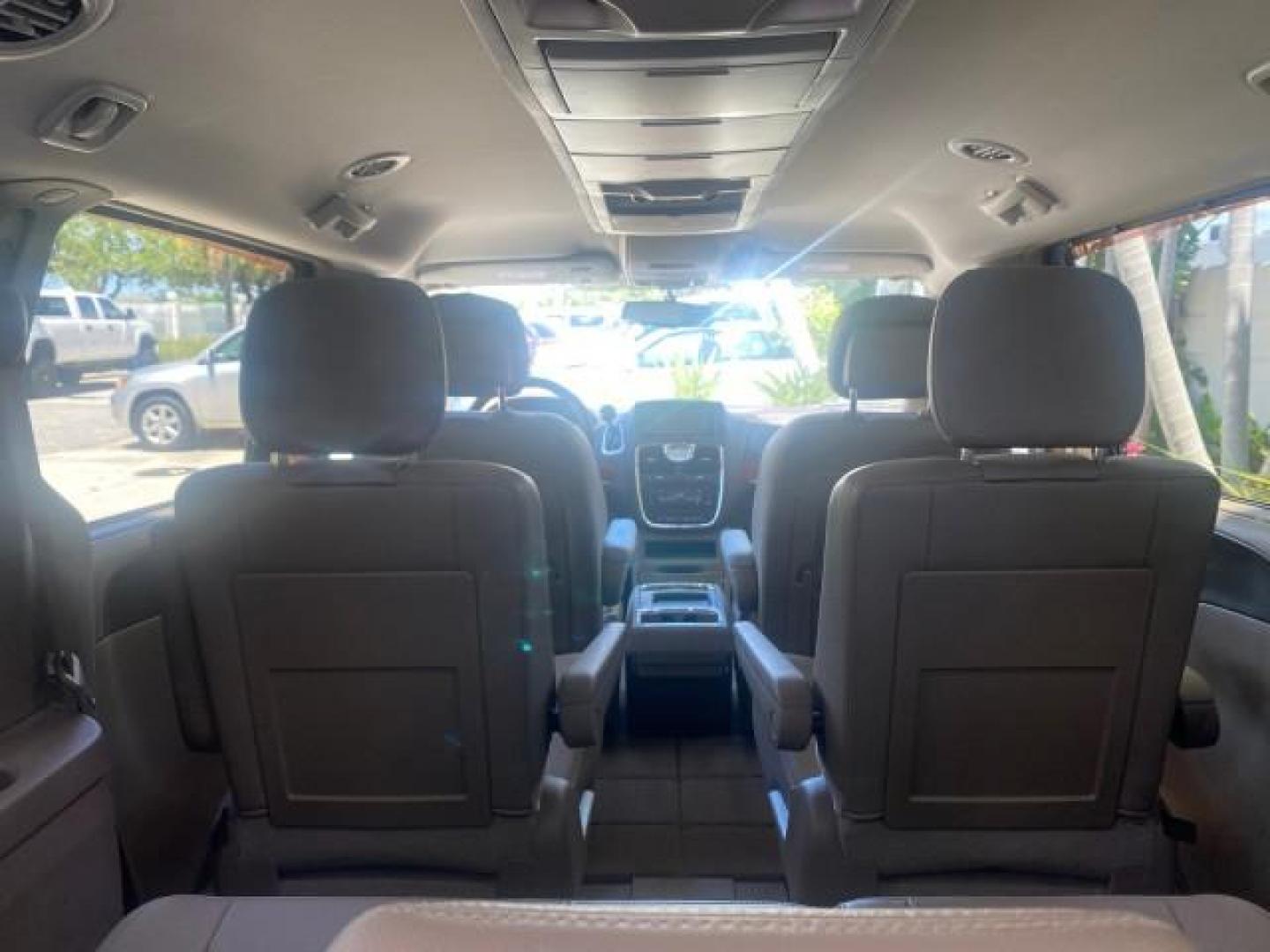 2014 Brilliant Black Crystal Pearlcoa /Dk Frost Beige/Med Beige Chrysler Town and Country Touring 1 OWNER LOW MILES 65,691 (2C4RC1BG1ER) with an 3.6L V6 Cylinder Engine engine, Automatic transmission, located at 4701 North Dixie Hwy, Pompano Beach, FL, 33064, (954) 422-2889, 26.240938, -80.123474 - OUR WEBPAGE FLORIDACARS1.COM HAS OVER 100 PHOTOS AND FREE CARFAX LINK 2014 CHRYSLER TOWN AND COUNTRY TOURING VIN: 2C4RC1BG1ER374547 2 C 4 R C 1 B G 1 E R 3 7 4 5 4 7 VAN 3.6L V6 F DOHC 24V GASOLINE FRONT WHEEL DRIVE Top Features Alloy Wheels Anniversary Edition Blind Spot Monitor Bluetooth Technolog - Photo#91