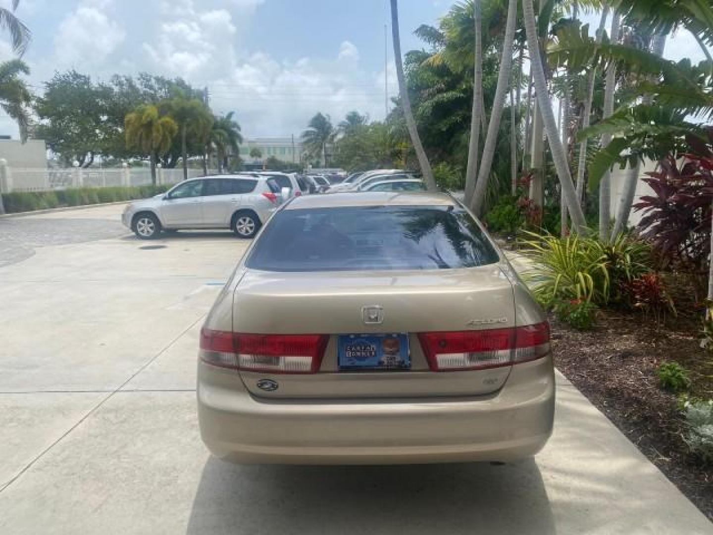 2004 Graphite Pearl /Ivory Honda Accord Sdn EX 1 OWNER LOW MILES 63,652 (1HGCM56614A) with an 2.4L DOHC MPFI 16-Valve i-VTEC I4 Engine engine, Automatic transmission, located at 4701 North Dixie Hwy, Pompano Beach, FL, 33064, (954) 422-2889, 26.240938, -80.123474 - OUR WEBPAGE FLORIDACARS1.COM HAS OVER 100 PHOTOS AND FREE CARFAX LINK 2004 HONDA ACCORD EX VIN: 1HGCM56614A033648 1 H G C M 5 6 6 1 4 A 0 3 3 6 4 8 SEDAN 4 DR 2.4L I4 F DOHC GASOLINE FRONT WHEEL DRIVE Top Features Alloy Wheels Cloth Seats Sunroof(s) Basic Features ABS Brakes AM/FM Stereo Air Conditi - Photo#6