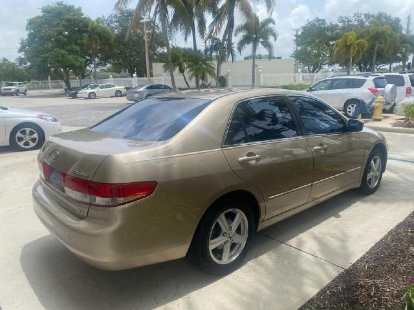2004 Graphite Pearl /Ivory Honda Accord Sdn EX 1 OWNER LOW MILES 63,652 (1HGCM56614A) with an 2.4L DOHC MPFI 16-Valve i-VTEC I4 Engine engine, Automatic transmission, located at 4701 North Dixie Hwy, Pompano Beach, FL, 33064, (954) 422-2889, 26.240938, -80.123474 - OUR WEBPAGE FLORIDACARS1.COM HAS OVER 100 PHOTOS AND FREE CARFAX LINK 2004 HONDA ACCORD EX VIN: 1HGCM56614A033648 1 H G C M 5 6 6 1 4 A 0 3 3 6 4 8 SEDAN 4 DR 2.4L I4 F DOHC GASOLINE FRONT WHEEL DRIVE Top Features Alloy Wheels Cloth Seats Sunroof(s) Basic Features ABS Brakes AM/FM Stereo Air Conditi - Photo#7