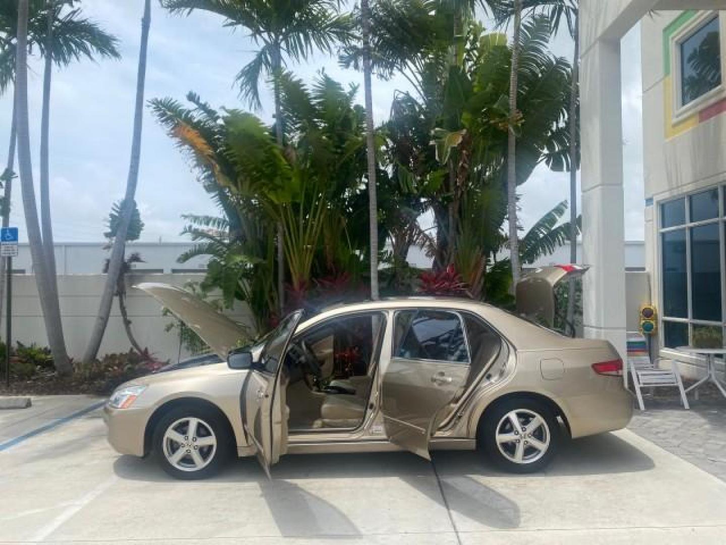 2004 Graphite Pearl /Ivory Honda Accord Sdn EX 1 OWNER LOW MILES 63,652 (1HGCM56614A) with an 2.4L DOHC MPFI 16-Valve i-VTEC I4 Engine engine, Automatic transmission, located at 4701 North Dixie Hwy, Pompano Beach, FL, 33064, (954) 422-2889, 26.240938, -80.123474 - OUR WEBPAGE FLORIDACARS1.COM HAS OVER 100 PHOTOS AND FREE CARFAX LINK 2004 HONDA ACCORD EX VIN: 1HGCM56614A033648 1 H G C M 5 6 6 1 4 A 0 3 3 6 4 8 SEDAN 4 DR 2.4L I4 F DOHC GASOLINE FRONT WHEEL DRIVE Top Features Alloy Wheels Cloth Seats Sunroof(s) Basic Features ABS Brakes AM/FM Stereo Air Conditi - Photo#8