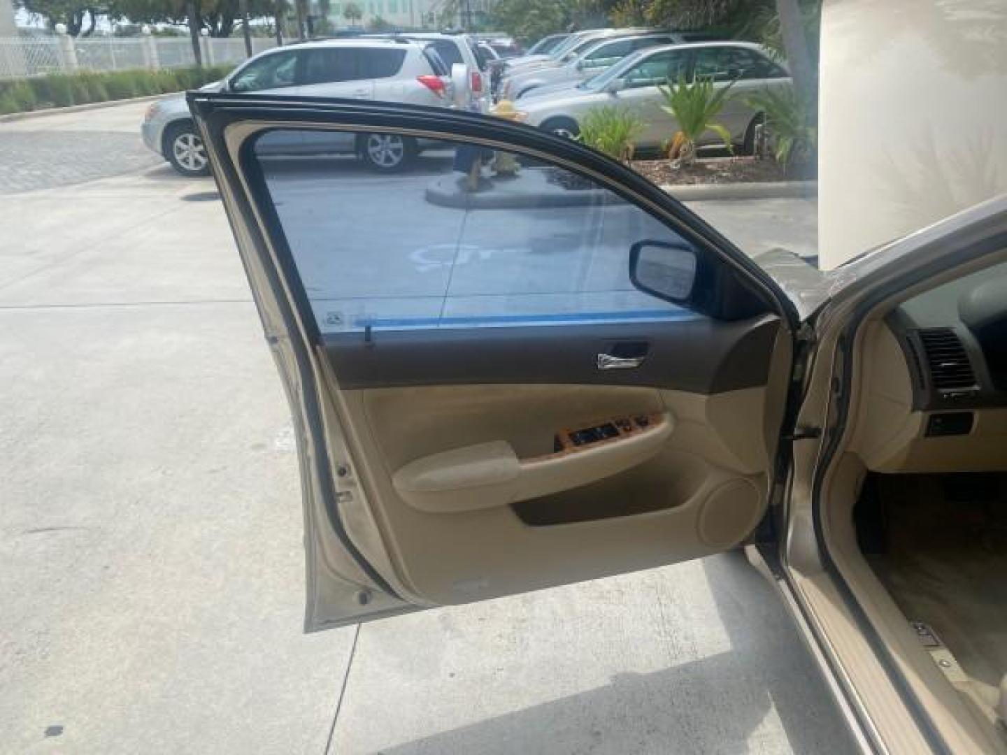 2004 Graphite Pearl /Ivory Honda Accord Sdn EX 1 OWNER LOW MILES 63,652 (1HGCM56614A) with an 2.4L DOHC MPFI 16-Valve i-VTEC I4 Engine engine, Automatic transmission, located at 4701 North Dixie Hwy, Pompano Beach, FL, 33064, (954) 422-2889, 26.240938, -80.123474 - OUR WEBPAGE FLORIDACARS1.COM HAS OVER 100 PHOTOS AND FREE CARFAX LINK 2004 HONDA ACCORD EX VIN: 1HGCM56614A033648 1 H G C M 5 6 6 1 4 A 0 3 3 6 4 8 SEDAN 4 DR 2.4L I4 F DOHC GASOLINE FRONT WHEEL DRIVE Top Features Alloy Wheels Cloth Seats Sunroof(s) Basic Features ABS Brakes AM/FM Stereo Air Conditi - Photo#9