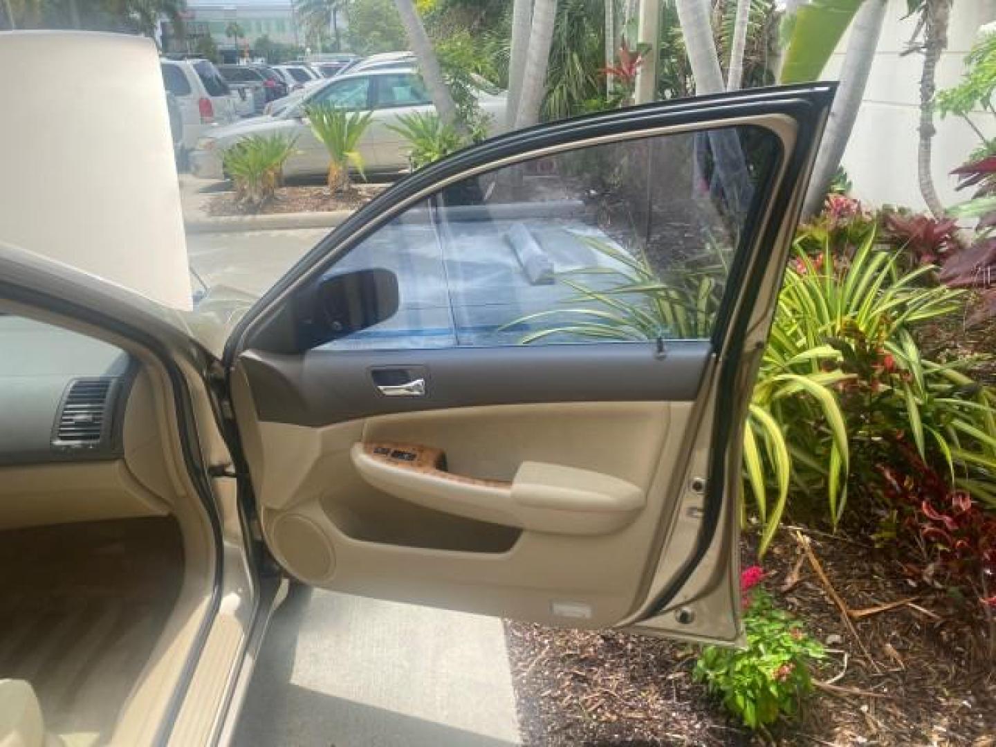 2004 Graphite Pearl /Ivory Honda Accord Sdn EX 1 OWNER LOW MILES 63,652 (1HGCM56614A) with an 2.4L DOHC MPFI 16-Valve i-VTEC I4 Engine engine, Automatic transmission, located at 4701 North Dixie Hwy, Pompano Beach, FL, 33064, (954) 422-2889, 26.240938, -80.123474 - OUR WEBPAGE FLORIDACARS1.COM HAS OVER 100 PHOTOS AND FREE CARFAX LINK 2004 HONDA ACCORD EX VIN: 1HGCM56614A033648 1 H G C M 5 6 6 1 4 A 0 3 3 6 4 8 SEDAN 4 DR 2.4L I4 F DOHC GASOLINE FRONT WHEEL DRIVE Top Features Alloy Wheels Cloth Seats Sunroof(s) Basic Features ABS Brakes AM/FM Stereo Air Conditi - Photo#11