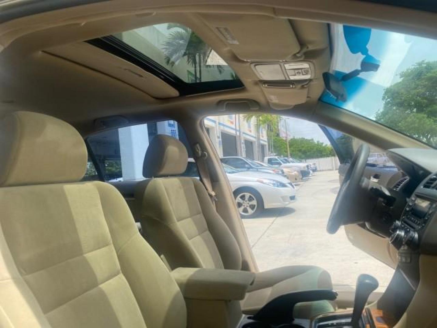 2004 Graphite Pearl /Ivory Honda Accord Sdn EX 1 OWNER LOW MILES 63,652 (1HGCM56614A) with an 2.4L DOHC MPFI 16-Valve i-VTEC I4 Engine engine, Automatic transmission, located at 4701 North Dixie Hwy, Pompano Beach, FL, 33064, (954) 422-2889, 26.240938, -80.123474 - OUR WEBPAGE FLORIDACARS1.COM HAS OVER 100 PHOTOS AND FREE CARFAX LINK 2004 HONDA ACCORD EX VIN: 1HGCM56614A033648 1 H G C M 5 6 6 1 4 A 0 3 3 6 4 8 SEDAN 4 DR 2.4L I4 F DOHC GASOLINE FRONT WHEEL DRIVE Top Features Alloy Wheels Cloth Seats Sunroof(s) Basic Features ABS Brakes AM/FM Stereo Air Conditi - Photo#12