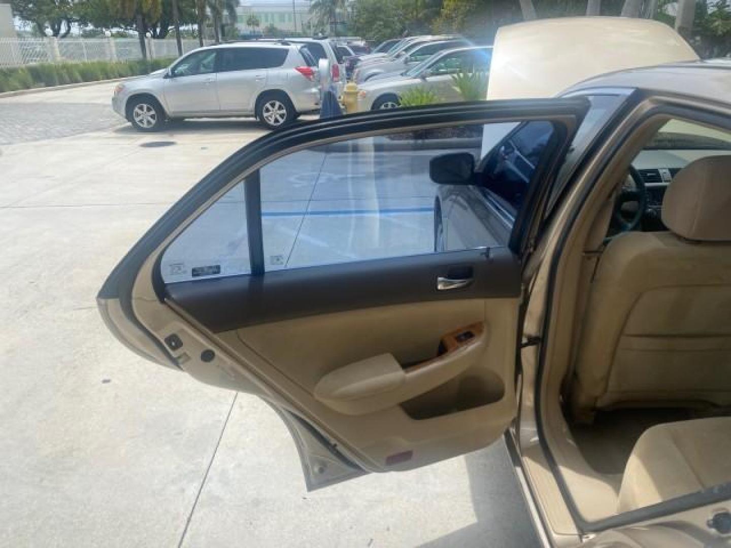2004 Graphite Pearl /Ivory Honda Accord Sdn EX 1 OWNER LOW MILES 63,652 (1HGCM56614A) with an 2.4L DOHC MPFI 16-Valve i-VTEC I4 Engine engine, Automatic transmission, located at 4701 North Dixie Hwy, Pompano Beach, FL, 33064, (954) 422-2889, 26.240938, -80.123474 - OUR WEBPAGE FLORIDACARS1.COM HAS OVER 100 PHOTOS AND FREE CARFAX LINK 2004 HONDA ACCORD EX VIN: 1HGCM56614A033648 1 H G C M 5 6 6 1 4 A 0 3 3 6 4 8 SEDAN 4 DR 2.4L I4 F DOHC GASOLINE FRONT WHEEL DRIVE Top Features Alloy Wheels Cloth Seats Sunroof(s) Basic Features ABS Brakes AM/FM Stereo Air Conditi - Photo#13