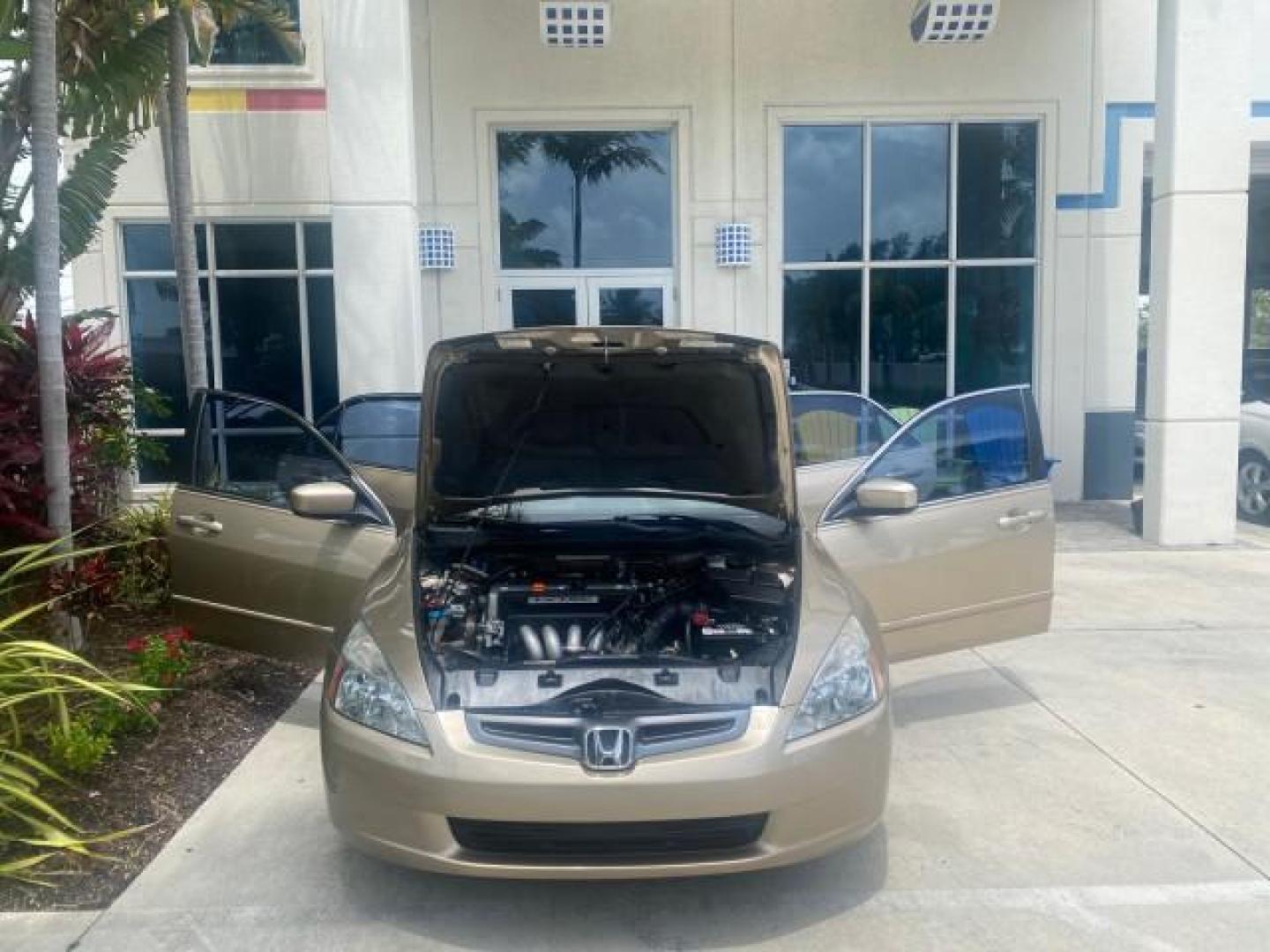 2004 Graphite Pearl /Ivory Honda Accord Sdn EX 1 OWNER LOW MILES 63,652 (1HGCM56614A) with an 2.4L DOHC MPFI 16-Valve i-VTEC I4 Engine engine, Automatic transmission, located at 4701 North Dixie Hwy, Pompano Beach, FL, 33064, (954) 422-2889, 26.240938, -80.123474 - OUR WEBPAGE FLORIDACARS1.COM HAS OVER 100 PHOTOS AND FREE CARFAX LINK 2004 HONDA ACCORD EX VIN: 1HGCM56614A033648 1 H G C M 5 6 6 1 4 A 0 3 3 6 4 8 SEDAN 4 DR 2.4L I4 F DOHC GASOLINE FRONT WHEEL DRIVE Top Features Alloy Wheels Cloth Seats Sunroof(s) Basic Features ABS Brakes AM/FM Stereo Air Conditi - Photo#16