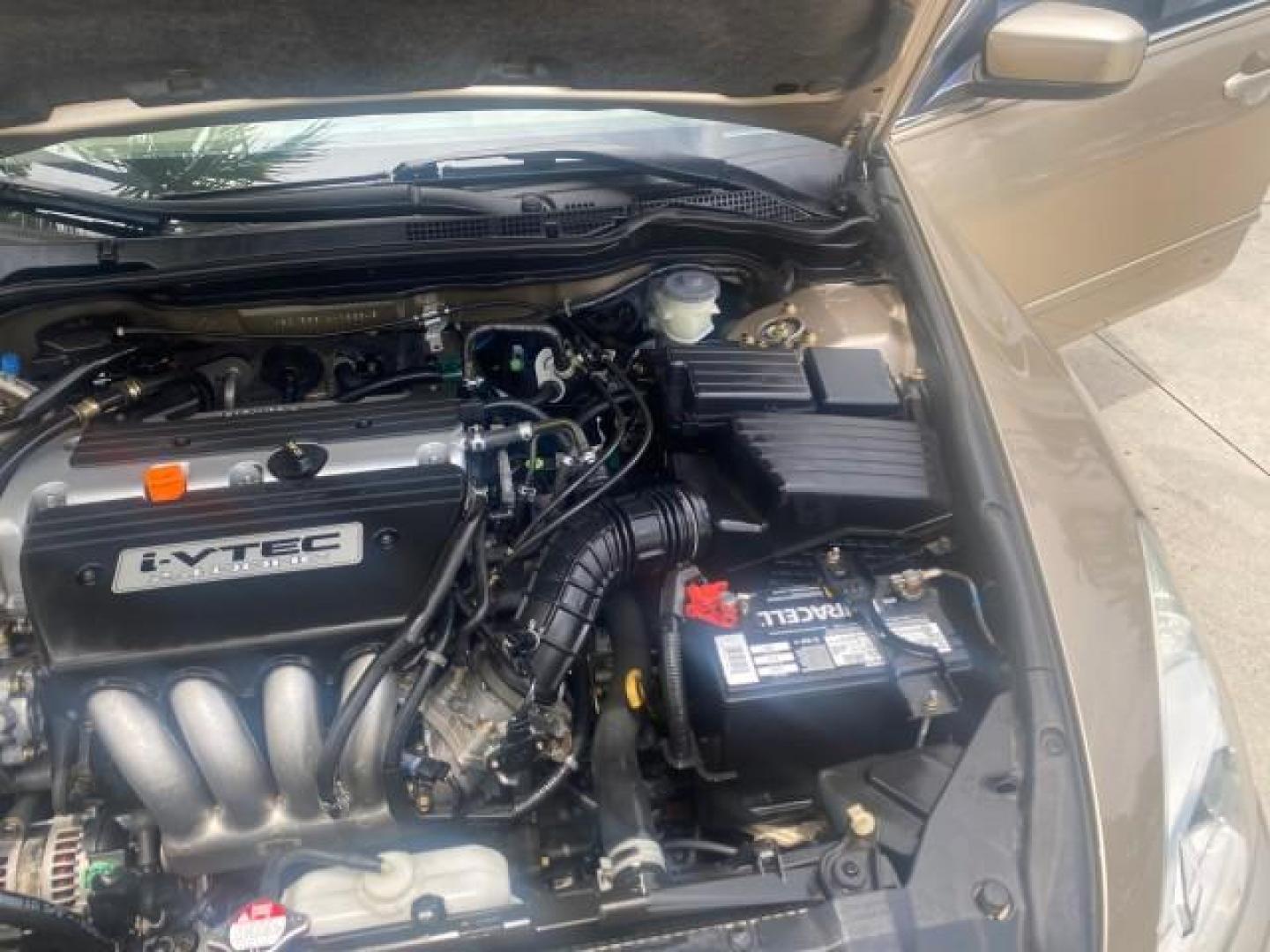 2004 Graphite Pearl /Ivory Honda Accord Sdn EX 1 OWNER LOW MILES 63,652 (1HGCM56614A) with an 2.4L DOHC MPFI 16-Valve i-VTEC I4 Engine engine, Automatic transmission, located at 4701 North Dixie Hwy, Pompano Beach, FL, 33064, (954) 422-2889, 26.240938, -80.123474 - OUR WEBPAGE FLORIDACARS1.COM HAS OVER 100 PHOTOS AND FREE CARFAX LINK 2004 HONDA ACCORD EX VIN: 1HGCM56614A033648 1 H G C M 5 6 6 1 4 A 0 3 3 6 4 8 SEDAN 4 DR 2.4L I4 F DOHC GASOLINE FRONT WHEEL DRIVE Top Features Alloy Wheels Cloth Seats Sunroof(s) Basic Features ABS Brakes AM/FM Stereo Air Conditi - Photo#26