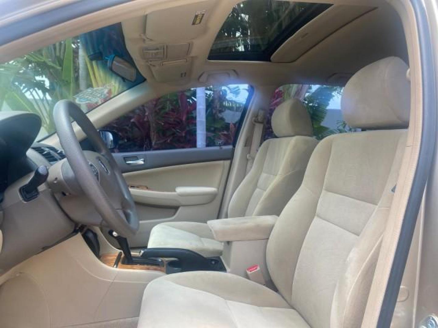 2004 Graphite Pearl /Ivory Honda Accord Sdn EX 1 OWNER LOW MILES 63,652 (1HGCM56614A) with an 2.4L DOHC MPFI 16-Valve i-VTEC I4 Engine engine, Automatic transmission, located at 4701 North Dixie Hwy, Pompano Beach, FL, 33064, (954) 422-2889, 26.240938, -80.123474 - OUR WEBPAGE FLORIDACARS1.COM HAS OVER 100 PHOTOS AND FREE CARFAX LINK 2004 HONDA ACCORD EX VIN: 1HGCM56614A033648 1 H G C M 5 6 6 1 4 A 0 3 3 6 4 8 SEDAN 4 DR 2.4L I4 F DOHC GASOLINE FRONT WHEEL DRIVE Top Features Alloy Wheels Cloth Seats Sunroof(s) Basic Features ABS Brakes AM/FM Stereo Air Conditi - Photo#33
