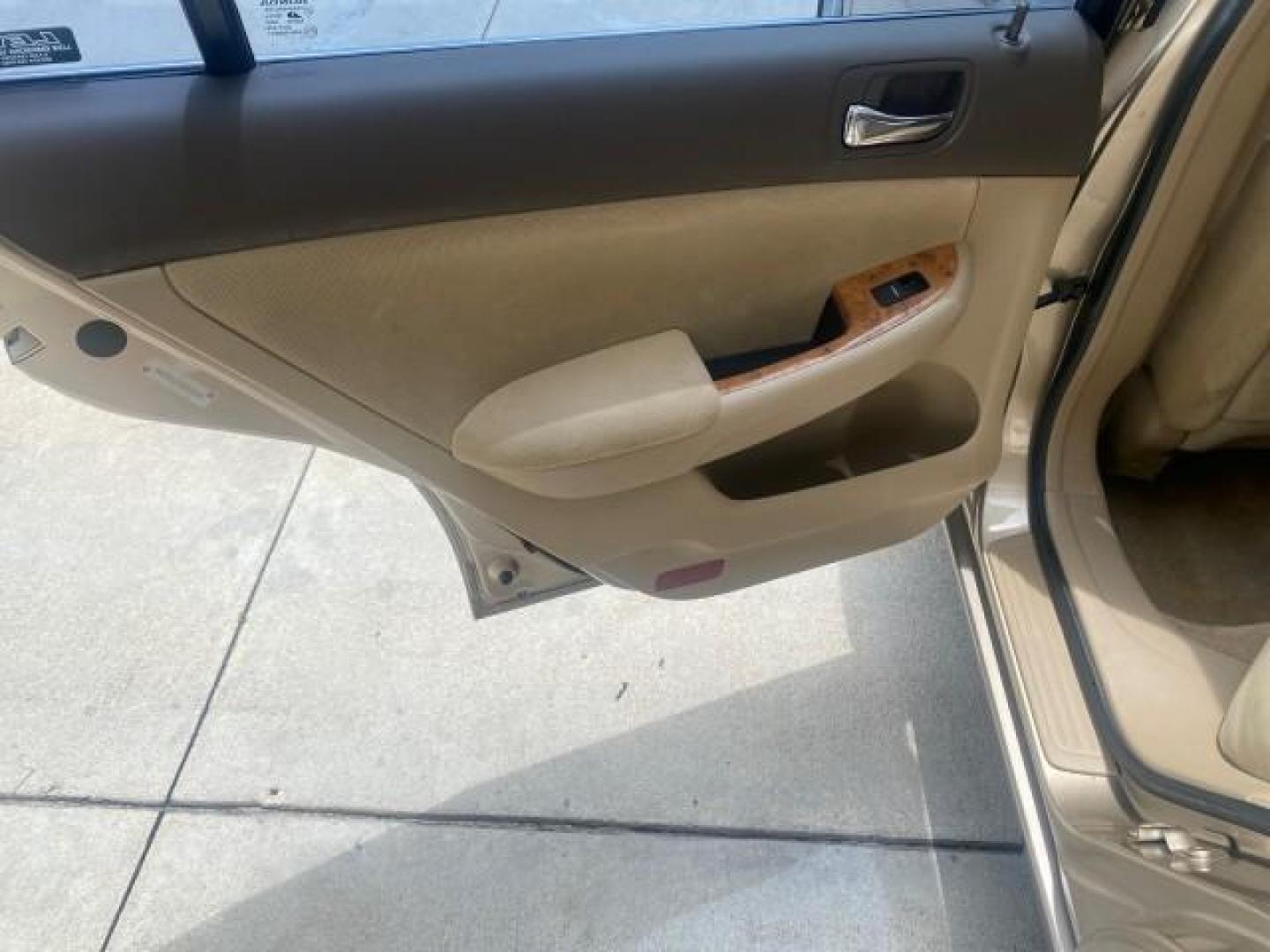 2004 Graphite Pearl /Ivory Honda Accord Sdn EX 1 OWNER LOW MILES 63,652 (1HGCM56614A) with an 2.4L DOHC MPFI 16-Valve i-VTEC I4 Engine engine, Automatic transmission, located at 4701 North Dixie Hwy, Pompano Beach, FL, 33064, (954) 422-2889, 26.240938, -80.123474 - OUR WEBPAGE FLORIDACARS1.COM HAS OVER 100 PHOTOS AND FREE CARFAX LINK 2004 HONDA ACCORD EX VIN: 1HGCM56614A033648 1 H G C M 5 6 6 1 4 A 0 3 3 6 4 8 SEDAN 4 DR 2.4L I4 F DOHC GASOLINE FRONT WHEEL DRIVE Top Features Alloy Wheels Cloth Seats Sunroof(s) Basic Features ABS Brakes AM/FM Stereo Air Conditi - Photo#66