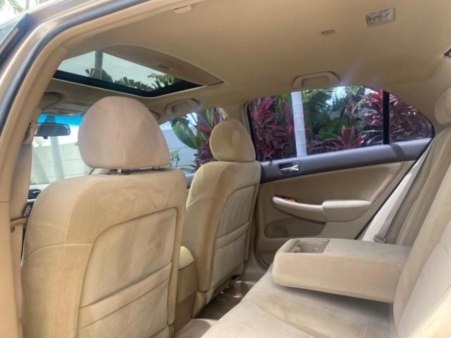 2004 Graphite Pearl /Ivory Honda Accord Sdn EX 1 OWNER LOW MILES 63,652 (1HGCM56614A) with an 2.4L DOHC MPFI 16-Valve i-VTEC I4 Engine engine, Automatic transmission, located at 4701 North Dixie Hwy, Pompano Beach, FL, 33064, (954) 422-2889, 26.240938, -80.123474 - OUR WEBPAGE FLORIDACARS1.COM HAS OVER 100 PHOTOS AND FREE CARFAX LINK 2004 HONDA ACCORD EX VIN: 1HGCM56614A033648 1 H G C M 5 6 6 1 4 A 0 3 3 6 4 8 SEDAN 4 DR 2.4L I4 F DOHC GASOLINE FRONT WHEEL DRIVE Top Features Alloy Wheels Cloth Seats Sunroof(s) Basic Features ABS Brakes AM/FM Stereo Air Conditi - Photo#70