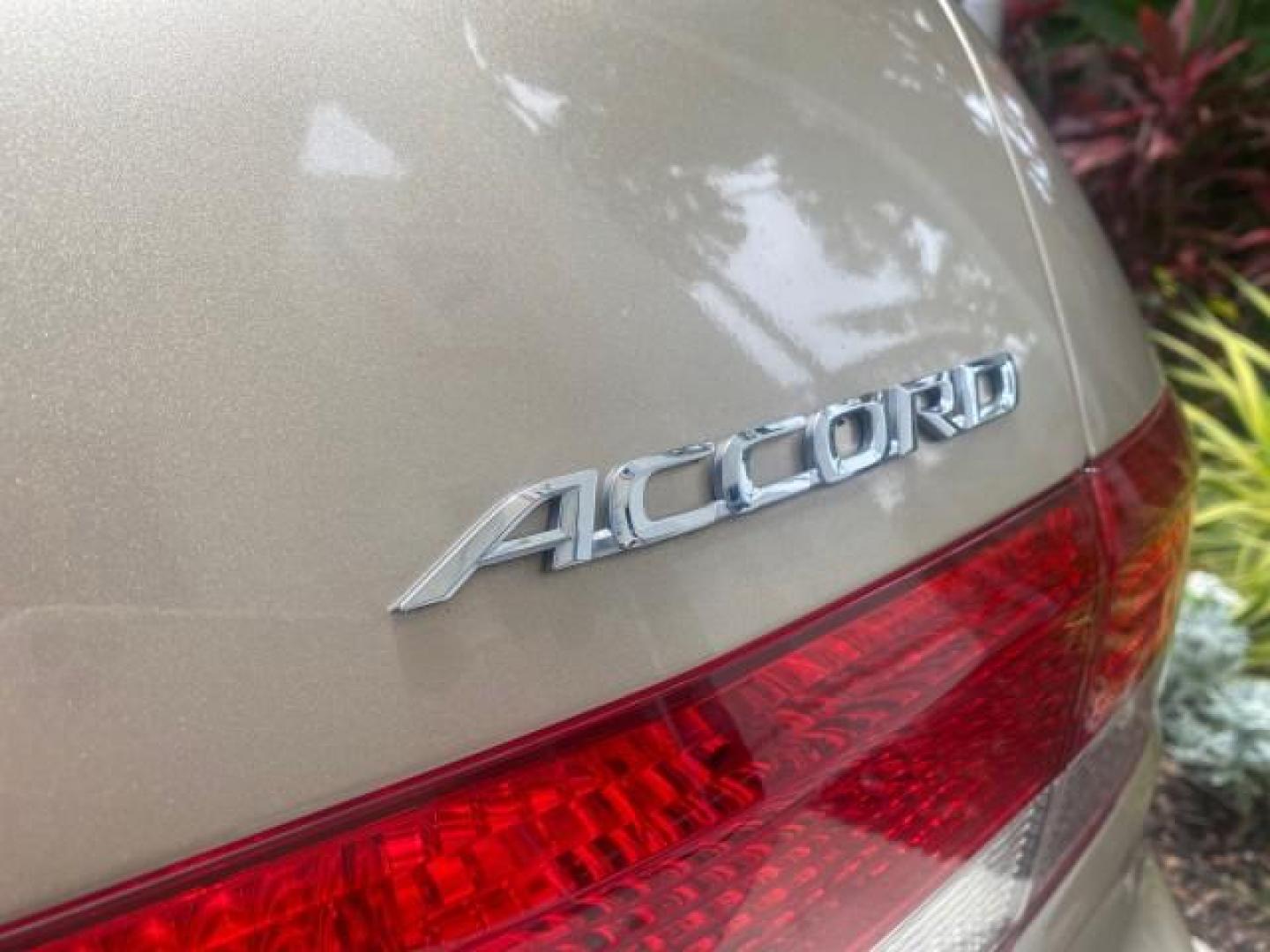 2004 Graphite Pearl /Ivory Honda Accord Sdn EX 1 OWNER LOW MILES 63,652 (1HGCM56614A) with an 2.4L DOHC MPFI 16-Valve i-VTEC I4 Engine engine, Automatic transmission, located at 4701 North Dixie Hwy, Pompano Beach, FL, 33064, (954) 422-2889, 26.240938, -80.123474 - OUR WEBPAGE FLORIDACARS1.COM HAS OVER 100 PHOTOS AND FREE CARFAX LINK 2004 HONDA ACCORD EX VIN: 1HGCM56614A033648 1 H G C M 5 6 6 1 4 A 0 3 3 6 4 8 SEDAN 4 DR 2.4L I4 F DOHC GASOLINE FRONT WHEEL DRIVE Top Features Alloy Wheels Cloth Seats Sunroof(s) Basic Features ABS Brakes AM/FM Stereo Air Conditi - Photo#82