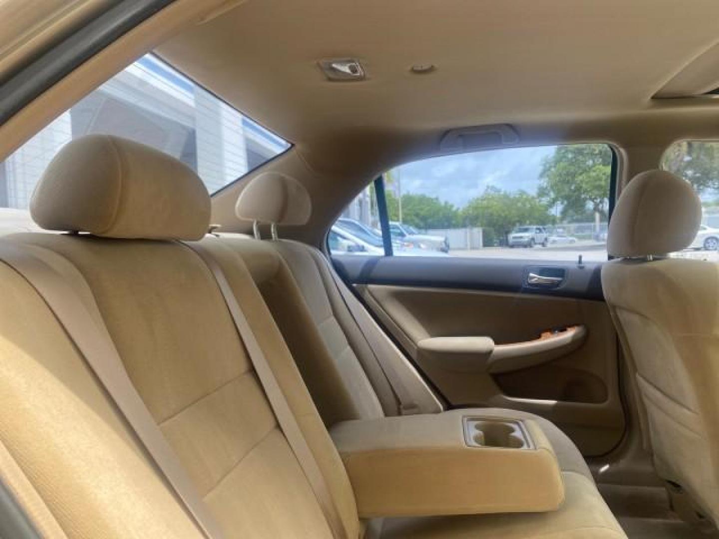 2004 Graphite Pearl /Ivory Honda Accord Sdn EX 1 OWNER LOW MILES 63,652 (1HGCM56614A) with an 2.4L DOHC MPFI 16-Valve i-VTEC I4 Engine engine, Automatic transmission, located at 4701 North Dixie Hwy, Pompano Beach, FL, 33064, (954) 422-2889, 26.240938, -80.123474 - OUR WEBPAGE FLORIDACARS1.COM HAS OVER 100 PHOTOS AND FREE CARFAX LINK 2004 HONDA ACCORD EX VIN: 1HGCM56614A033648 1 H G C M 5 6 6 1 4 A 0 3 3 6 4 8 SEDAN 4 DR 2.4L I4 F DOHC GASOLINE FRONT WHEEL DRIVE Top Features Alloy Wheels Cloth Seats Sunroof(s) Basic Features ABS Brakes AM/FM Stereo Air Conditi - Photo#94