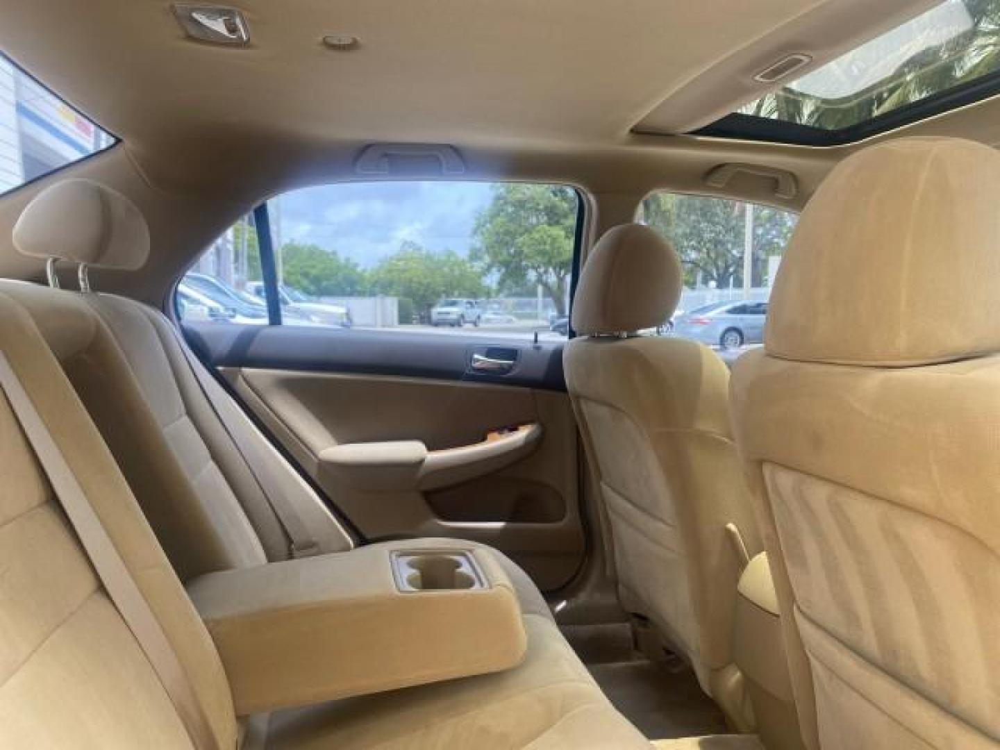 2004 Graphite Pearl /Ivory Honda Accord Sdn EX 1 OWNER LOW MILES 63,652 (1HGCM56614A) with an 2.4L DOHC MPFI 16-Valve i-VTEC I4 Engine engine, Automatic transmission, located at 4701 North Dixie Hwy, Pompano Beach, FL, 33064, (954) 422-2889, 26.240938, -80.123474 - OUR WEBPAGE FLORIDACARS1.COM HAS OVER 100 PHOTOS AND FREE CARFAX LINK 2004 HONDA ACCORD EX VIN: 1HGCM56614A033648 1 H G C M 5 6 6 1 4 A 0 3 3 6 4 8 SEDAN 4 DR 2.4L I4 F DOHC GASOLINE FRONT WHEEL DRIVE Top Features Alloy Wheels Cloth Seats Sunroof(s) Basic Features ABS Brakes AM/FM Stereo Air Conditi - Photo#96