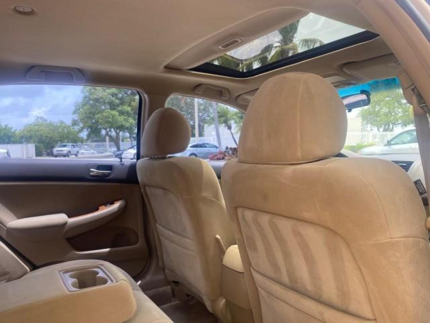 2004 Graphite Pearl /Ivory Honda Accord Sdn EX 1 OWNER LOW MILES 63,652 (1HGCM56614A) with an 2.4L DOHC MPFI 16-Valve i-VTEC I4 Engine engine, Automatic transmission, located at 4701 North Dixie Hwy, Pompano Beach, FL, 33064, (954) 422-2889, 26.240938, -80.123474 - OUR WEBPAGE FLORIDACARS1.COM HAS OVER 100 PHOTOS AND FREE CARFAX LINK 2004 HONDA ACCORD EX VIN: 1HGCM56614A033648 1 H G C M 5 6 6 1 4 A 0 3 3 6 4 8 SEDAN 4 DR 2.4L I4 F DOHC GASOLINE FRONT WHEEL DRIVE Top Features Alloy Wheels Cloth Seats Sunroof(s) Basic Features ABS Brakes AM/FM Stereo Air Conditi - Photo#97