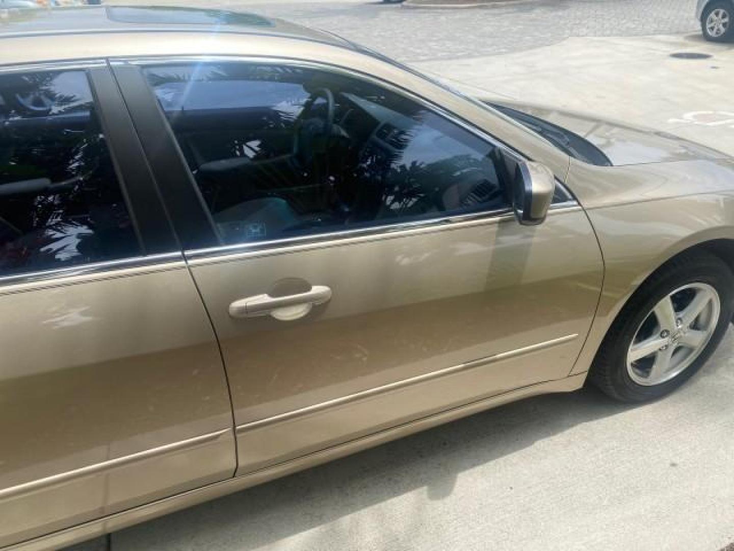 2004 Graphite Pearl /Ivory Honda Accord Sdn EX 1 OWNER LOW MILES 63,652 (1HGCM56614A) with an 2.4L DOHC MPFI 16-Valve i-VTEC I4 Engine engine, Automatic transmission, located at 4701 North Dixie Hwy, Pompano Beach, FL, 33064, (954) 422-2889, 26.240938, -80.123474 - OUR WEBPAGE FLORIDACARS1.COM HAS OVER 100 PHOTOS AND FREE CARFAX LINK 2004 HONDA ACCORD EX VIN: 1HGCM56614A033648 1 H G C M 5 6 6 1 4 A 0 3 3 6 4 8 SEDAN 4 DR 2.4L I4 F DOHC GASOLINE FRONT WHEEL DRIVE Top Features Alloy Wheels Cloth Seats Sunroof(s) Basic Features ABS Brakes AM/FM Stereo Air Conditi - Photo#99
