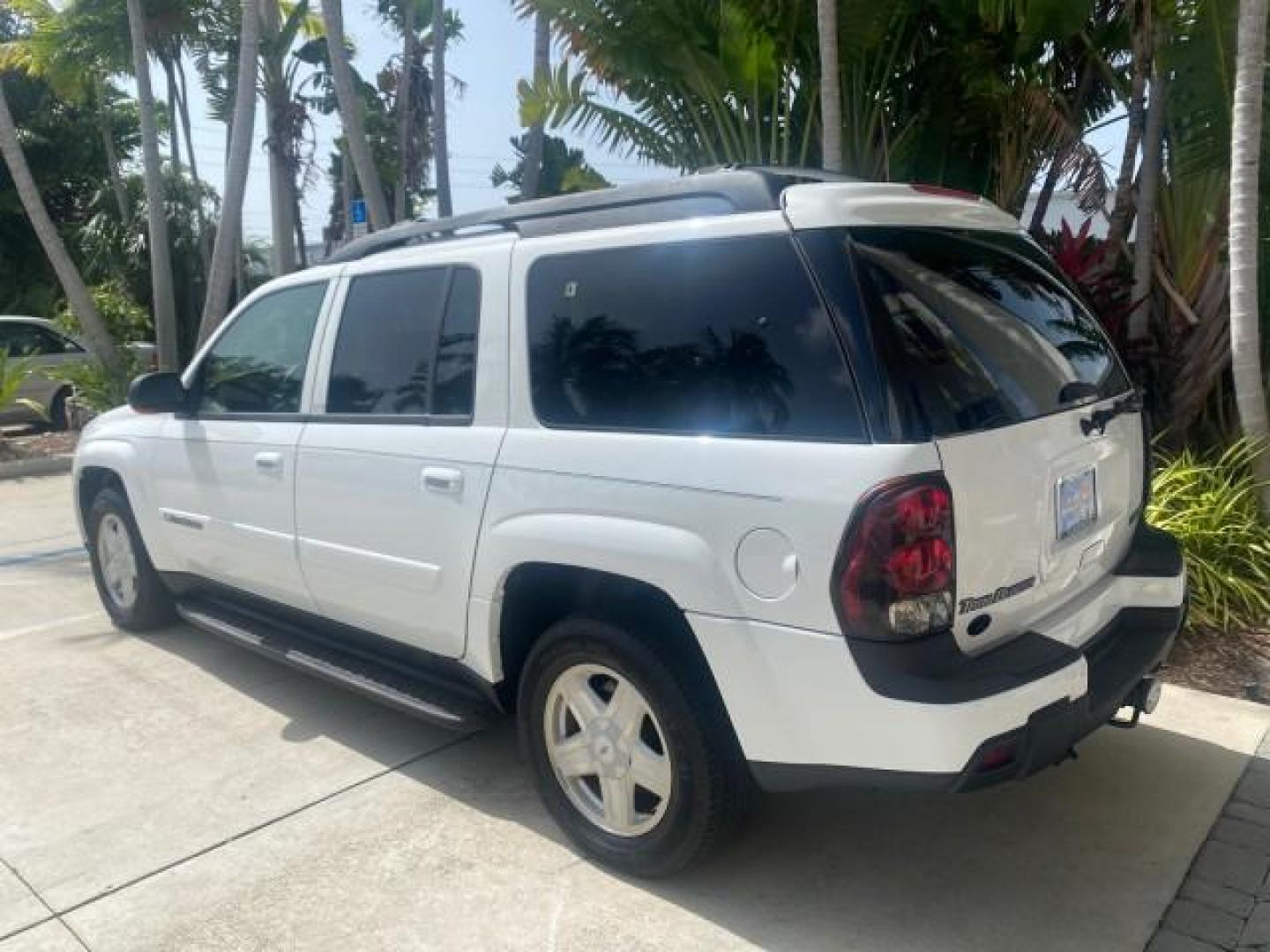 2002 Summit White /Medium Pewter Chevrolet TrailBlazer EXT LT NO ACCIDENTS (1GNES16S826) with an 4.2L Vortec 4200 DOHC SFI 24-Valve I6 Engine engine, Automatic transmission, located at 4701 North Dixie Hwy, Pompano Beach, FL, 33064, (954) 422-2889, 26.240938, -80.123474 - OUR WEBPAGE FLORIDACARS1.COM HAS OVER 100 PHOTOS AND FREE CARFAX LINK 2002 CHEVROLET TRAILBLAZER EXT LT VIN: 1GNES16S826101602 1 G N E S 1 6 S 8 2 6 1 0 1 6 0 2 4 DOOR WAGON/SPORT UTILITY 4.2L I6 F DOHC GASOLINE REAR WHEEL DRIVE Top Features Alloy Wheels Leather Seats Running Boards Tow Hitch Basic - Photo#80