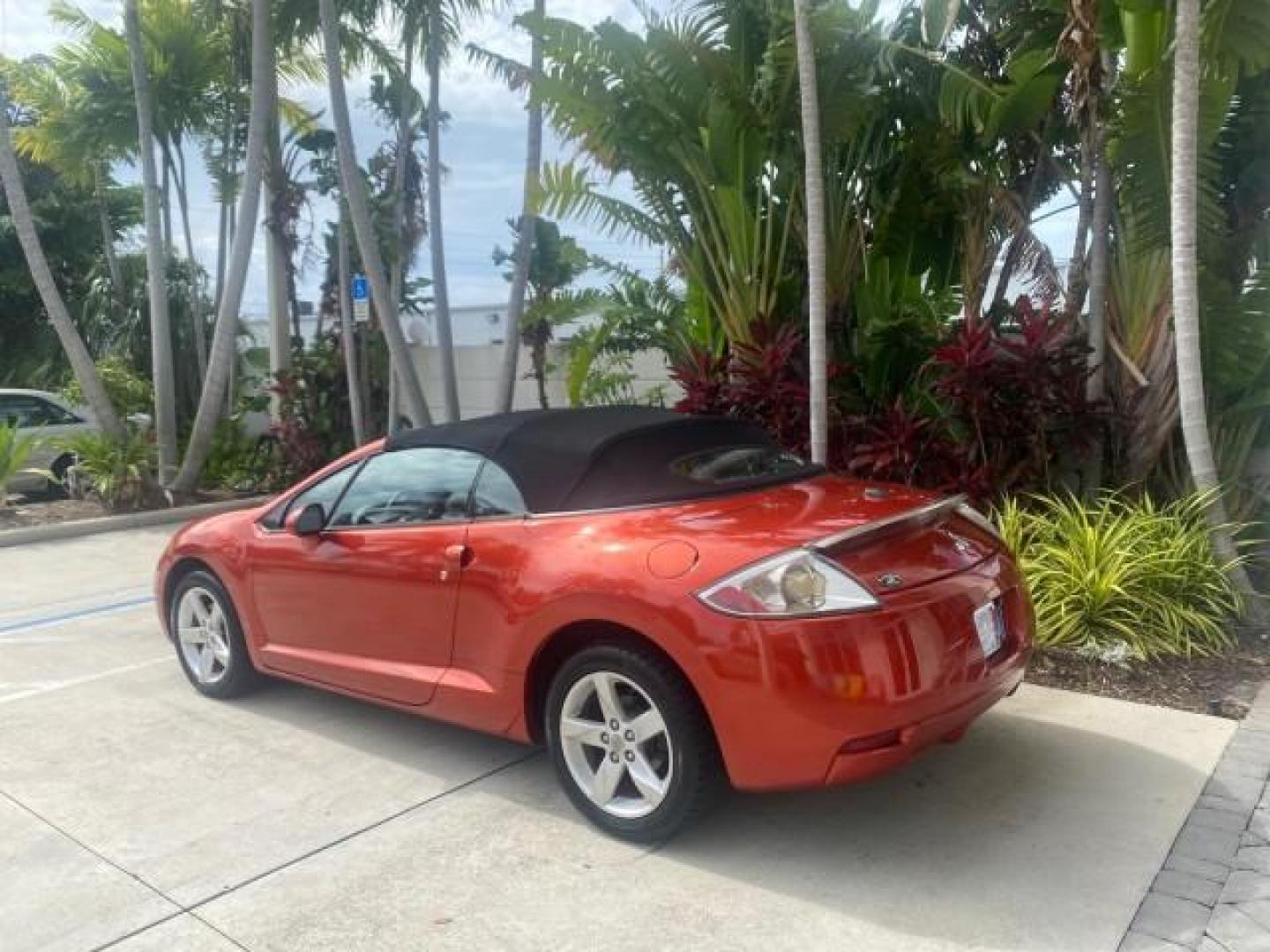2008 Rave Red Pearl /Dark Charcoal Mitsubishi Eclipse GS LOW MILES 53,445 (4A3AL25F58E) with an 2.4L SOHC MPFI 16-Valve MIVEC I4 Engine engine, Automatic transmission, located at 4701 North Dixie Hwy, Pompano Beach, FL, 33064, (954) 422-2889, 26.240938, -80.123474 - OUR WEBPAGE FLORIDACARS1.COM HAS OVER 100 PHOTOS AND FREE CARFAX LINK 2008 MITSUBISHI ECLIPSE SPYDER GS VIN: 4A3AL25F58E038789 4 A 3 A L 2 5 F 5 8 E 0 3 8 7 8 9 CONVERTIBLE 2.4L I4 F SOHC 16V GASOLINE FRONT WHEEL DRIVE Top Features Alloy Wheels Cloth Seats Rockford Fosgate Sound Satellite Radio Read - Photo#5