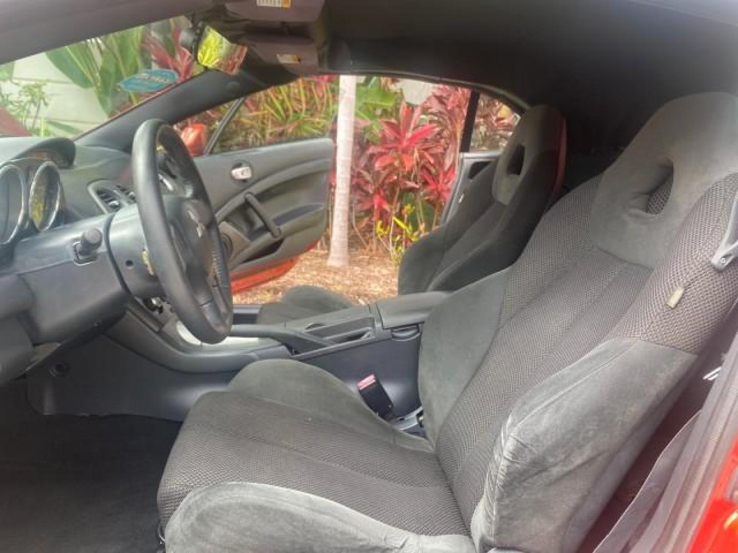 2008 Rave Red Pearl /Dark Charcoal Mitsubishi Eclipse GS LOW MILES 53,445 (4A3AL25F58E) with an 2.4L SOHC MPFI 16-Valve MIVEC I4 Engine engine, Automatic transmission, located at 4701 North Dixie Hwy, Pompano Beach, FL, 33064, (954) 422-2889, 26.240938, -80.123474 - OUR WEBPAGE FLORIDACARS1.COM HAS OVER 100 PHOTOS AND FREE CARFAX LINK 2008 MITSUBISHI ECLIPSE SPYDER GS VIN: 4A3AL25F58E038789 4 A 3 A L 2 5 F 5 8 E 0 3 8 7 8 9 CONVERTIBLE 2.4L I4 F SOHC 16V GASOLINE FRONT WHEEL DRIVE Top Features Alloy Wheels Cloth Seats Rockford Fosgate Sound Satellite Radio Read - Photo#10