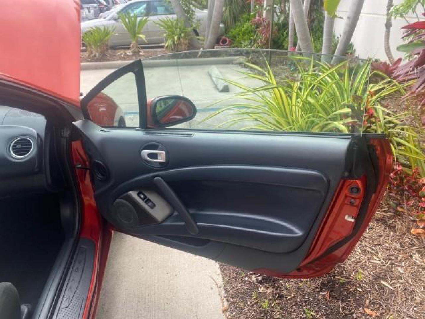 2008 Rave Red Pearl /Dark Charcoal Mitsubishi Eclipse GS LOW MILES 53,445 (4A3AL25F58E) with an 2.4L SOHC MPFI 16-Valve MIVEC I4 Engine engine, Automatic transmission, located at 4701 North Dixie Hwy, Pompano Beach, FL, 33064, (954) 422-2889, 26.240938, -80.123474 - OUR WEBPAGE FLORIDACARS1.COM HAS OVER 100 PHOTOS AND FREE CARFAX LINK 2008 MITSUBISHI ECLIPSE SPYDER GS VIN: 4A3AL25F58E038789 4 A 3 A L 2 5 F 5 8 E 0 3 8 7 8 9 CONVERTIBLE 2.4L I4 F SOHC 16V GASOLINE FRONT WHEEL DRIVE Top Features Alloy Wheels Cloth Seats Rockford Fosgate Sound Satellite Radio Read - Photo#11
