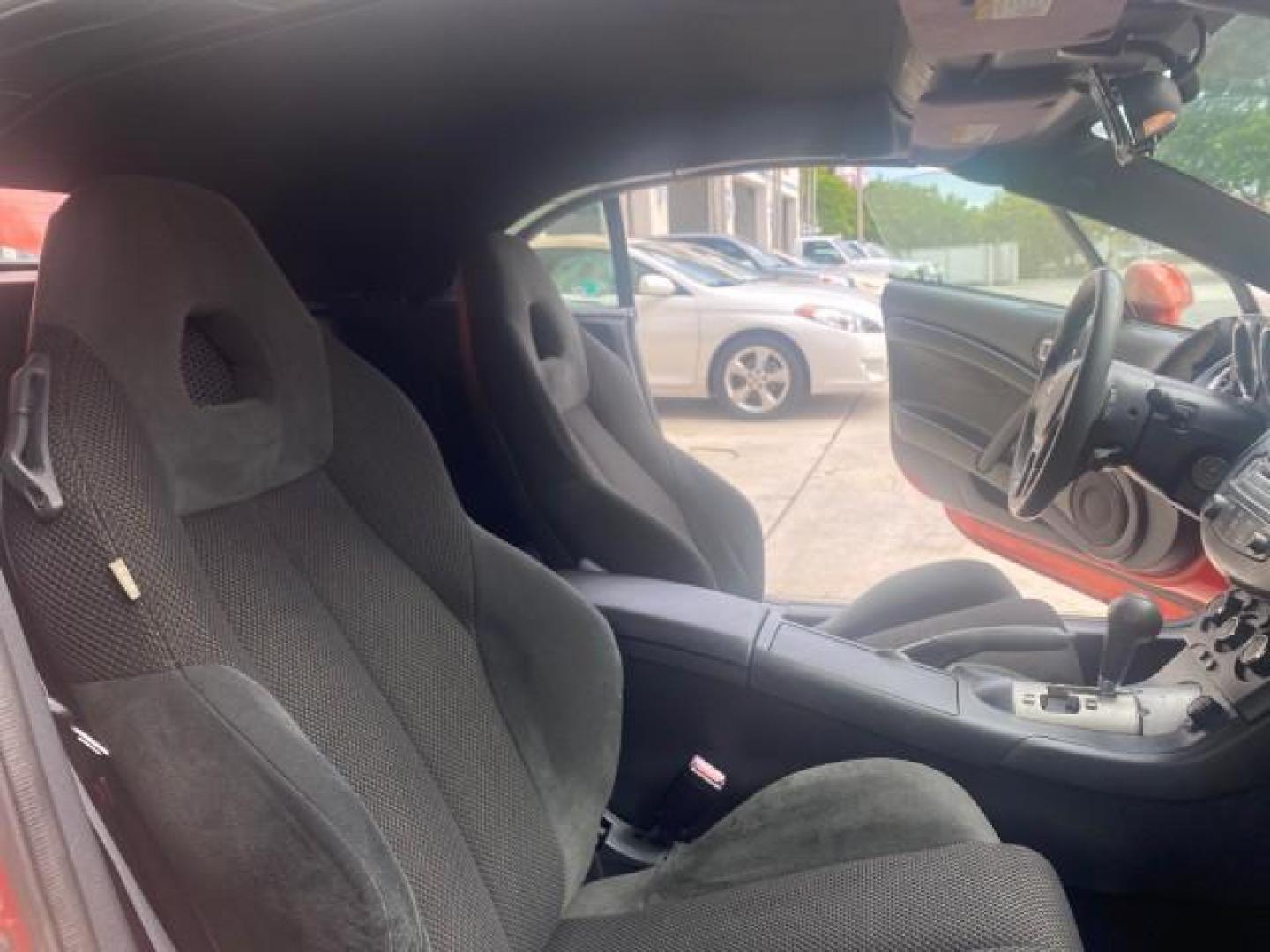 2008 Rave Red Pearl /Dark Charcoal Mitsubishi Eclipse GS LOW MILES 53,445 (4A3AL25F58E) with an 2.4L SOHC MPFI 16-Valve MIVEC I4 Engine engine, Automatic transmission, located at 4701 North Dixie Hwy, Pompano Beach, FL, 33064, (954) 422-2889, 26.240938, -80.123474 - OUR WEBPAGE FLORIDACARS1.COM HAS OVER 100 PHOTOS AND FREE CARFAX LINK 2008 MITSUBISHI ECLIPSE SPYDER GS VIN: 4A3AL25F58E038789 4 A 3 A L 2 5 F 5 8 E 0 3 8 7 8 9 CONVERTIBLE 2.4L I4 F SOHC 16V GASOLINE FRONT WHEEL DRIVE Top Features Alloy Wheels Cloth Seats Rockford Fosgate Sound Satellite Radio Read - Photo#12