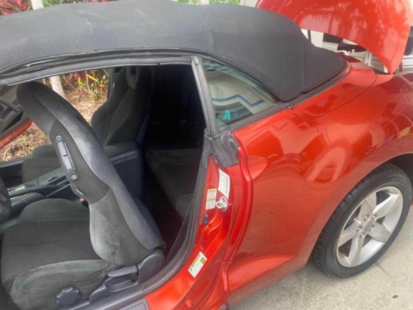 2008 Rave Red Pearl /Dark Charcoal Mitsubishi Eclipse GS LOW MILES 53,445 (4A3AL25F58E) with an 2.4L SOHC MPFI 16-Valve MIVEC I4 Engine engine, Automatic transmission, located at 4701 North Dixie Hwy, Pompano Beach, FL, 33064, (954) 422-2889, 26.240938, -80.123474 - OUR WEBPAGE FLORIDACARS1.COM HAS OVER 100 PHOTOS AND FREE CARFAX LINK 2008 MITSUBISHI ECLIPSE SPYDER GS VIN: 4A3AL25F58E038789 4 A 3 A L 2 5 F 5 8 E 0 3 8 7 8 9 CONVERTIBLE 2.4L I4 F SOHC 16V GASOLINE FRONT WHEEL DRIVE Top Features Alloy Wheels Cloth Seats Rockford Fosgate Sound Satellite Radio Read - Photo#13