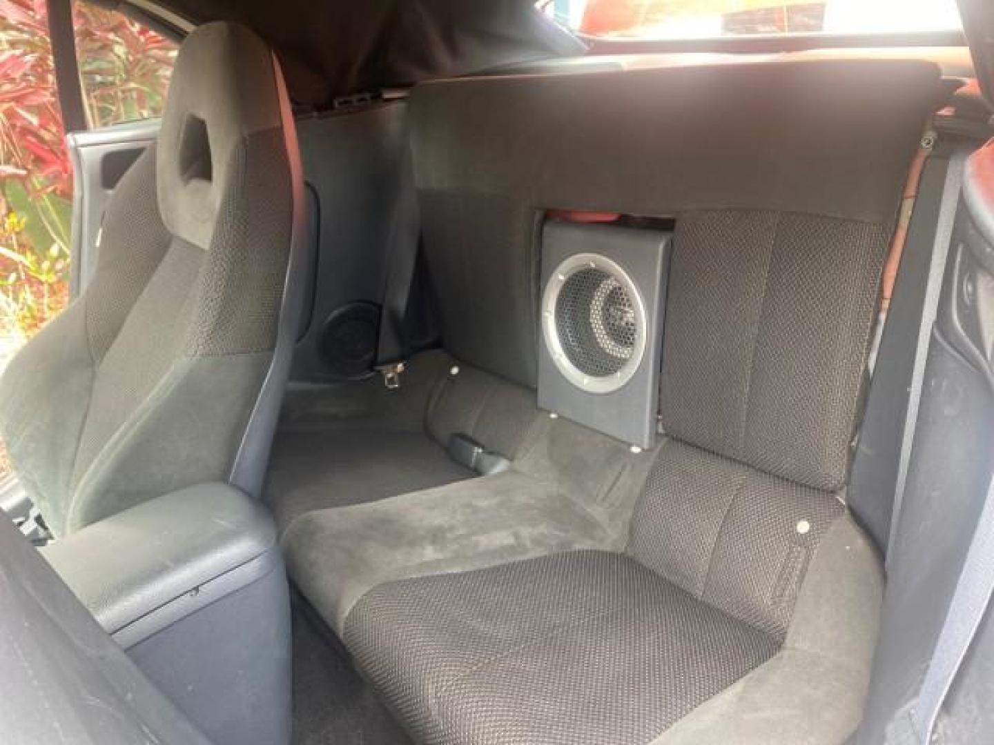 2008 Rave Red Pearl /Dark Charcoal Mitsubishi Eclipse GS LOW MILES 53,445 (4A3AL25F58E) with an 2.4L SOHC MPFI 16-Valve MIVEC I4 Engine engine, Automatic transmission, located at 4701 North Dixie Hwy, Pompano Beach, FL, 33064, (954) 422-2889, 26.240938, -80.123474 - OUR WEBPAGE FLORIDACARS1.COM HAS OVER 100 PHOTOS AND FREE CARFAX LINK 2008 MITSUBISHI ECLIPSE SPYDER GS VIN: 4A3AL25F58E038789 4 A 3 A L 2 5 F 5 8 E 0 3 8 7 8 9 CONVERTIBLE 2.4L I4 F SOHC 16V GASOLINE FRONT WHEEL DRIVE Top Features Alloy Wheels Cloth Seats Rockford Fosgate Sound Satellite Radio Read - Photo#14