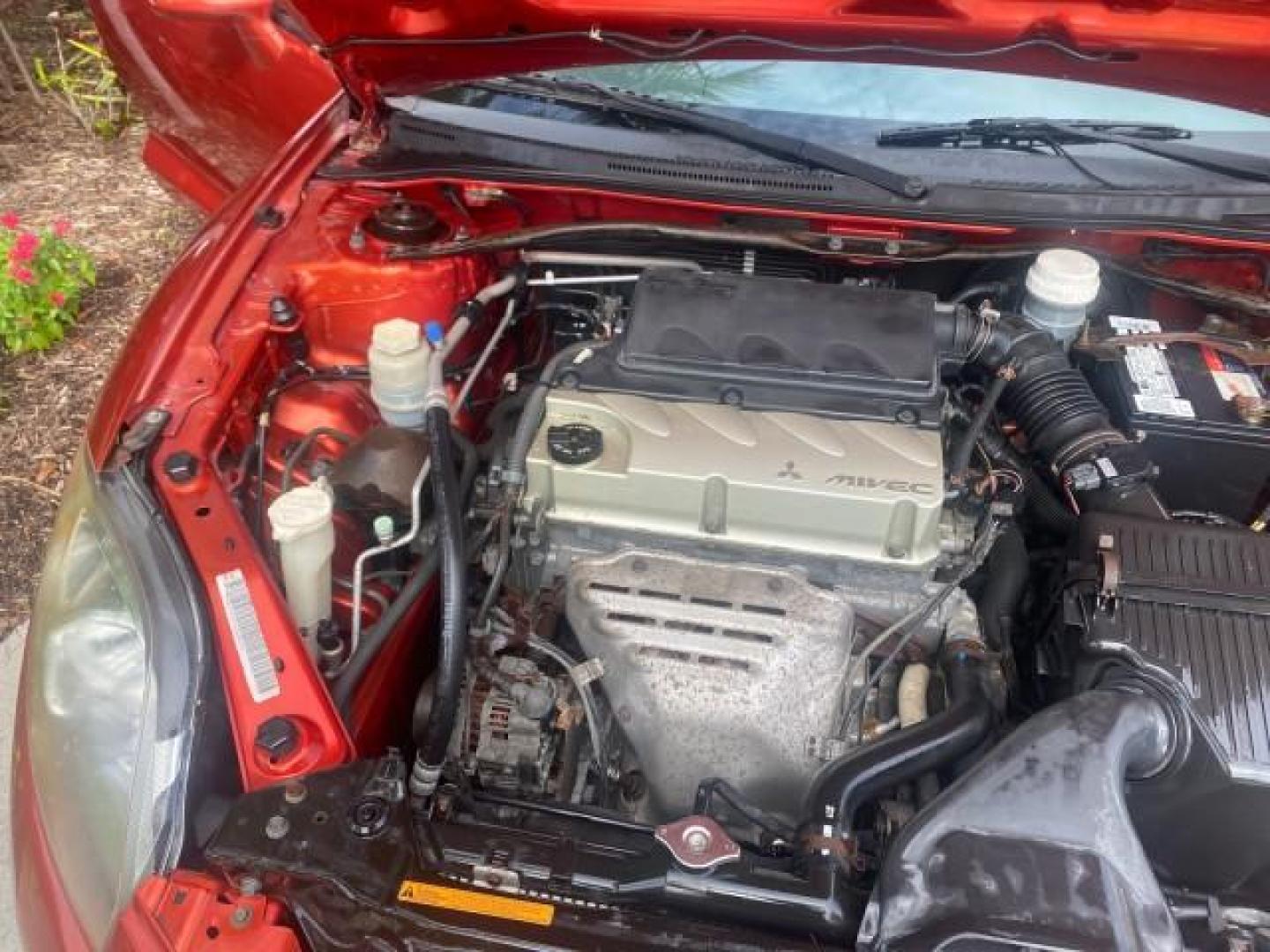 2008 Rave Red Pearl /Dark Charcoal Mitsubishi Eclipse GS LOW MILES 53,445 (4A3AL25F58E) with an 2.4L SOHC MPFI 16-Valve MIVEC I4 Engine engine, Automatic transmission, located at 4701 North Dixie Hwy, Pompano Beach, FL, 33064, (954) 422-2889, 26.240938, -80.123474 - OUR WEBPAGE FLORIDACARS1.COM HAS OVER 100 PHOTOS AND FREE CARFAX LINK 2008 MITSUBISHI ECLIPSE SPYDER GS VIN: 4A3AL25F58E038789 4 A 3 A L 2 5 F 5 8 E 0 3 8 7 8 9 CONVERTIBLE 2.4L I4 F SOHC 16V GASOLINE FRONT WHEEL DRIVE Top Features Alloy Wheels Cloth Seats Rockford Fosgate Sound Satellite Radio Read - Photo#25