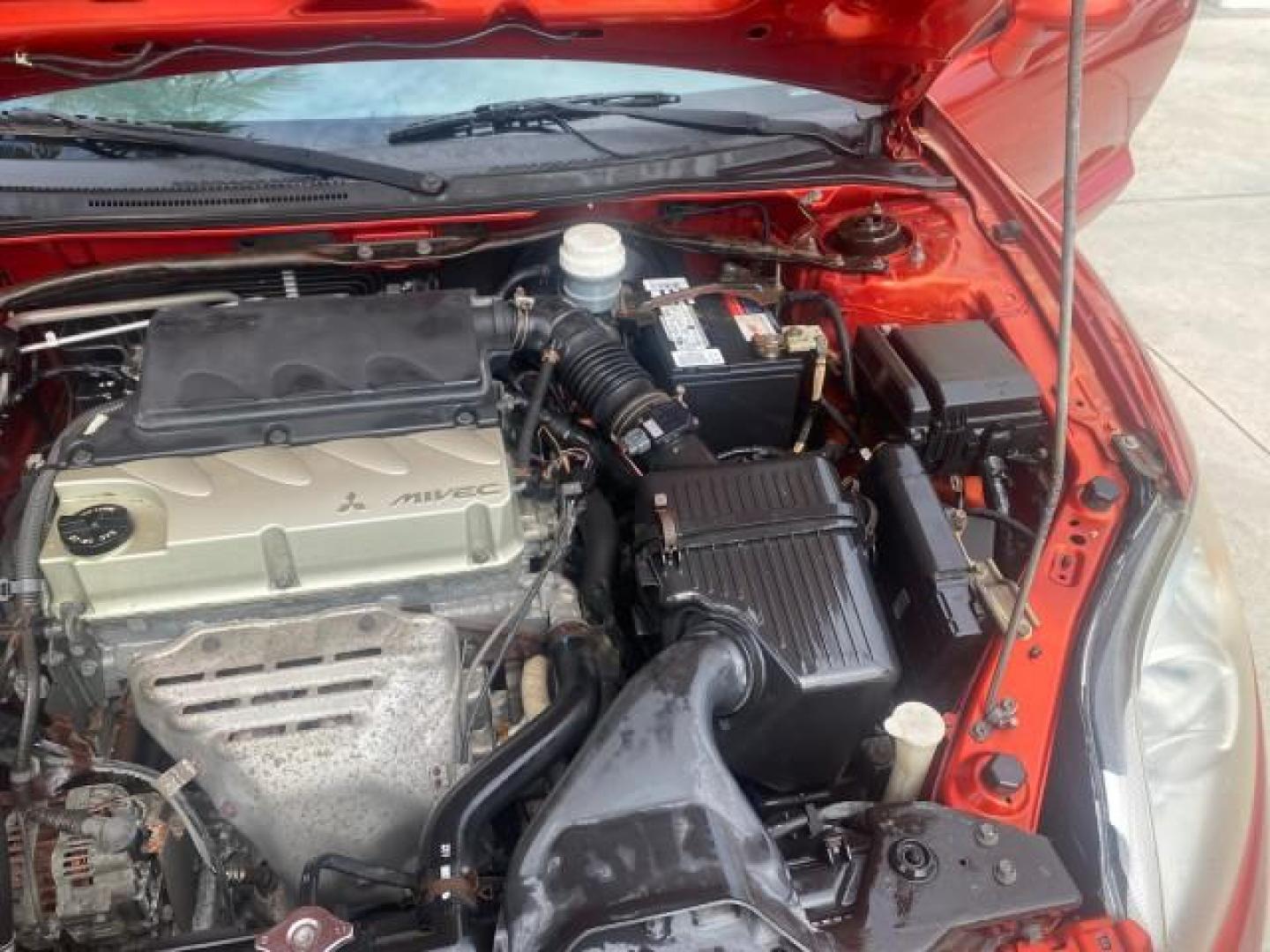 2008 Rave Red Pearl /Dark Charcoal Mitsubishi Eclipse GS LOW MILES 53,445 (4A3AL25F58E) with an 2.4L SOHC MPFI 16-Valve MIVEC I4 Engine engine, Automatic transmission, located at 4701 North Dixie Hwy, Pompano Beach, FL, 33064, (954) 422-2889, 26.240938, -80.123474 - OUR WEBPAGE FLORIDACARS1.COM HAS OVER 100 PHOTOS AND FREE CARFAX LINK 2008 MITSUBISHI ECLIPSE SPYDER GS VIN: 4A3AL25F58E038789 4 A 3 A L 2 5 F 5 8 E 0 3 8 7 8 9 CONVERTIBLE 2.4L I4 F SOHC 16V GASOLINE FRONT WHEEL DRIVE Top Features Alloy Wheels Cloth Seats Rockford Fosgate Sound Satellite Radio Read - Photo#26