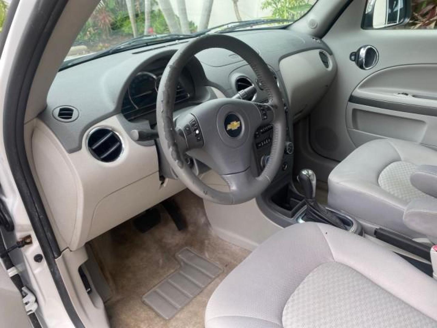 2011 Arctic Ice /Gray Chevrolet HHR LT w/2LT (3GNBACFU5BS) with an Ecotec 2.4L VVT DOHC 4-Cyl SFI E85 Engine engine, Automatic transmission, located at 4701 North Dixie Hwy, Pompano Beach, FL, 33064, (954) 422-2889, 26.240938, -80.123474 - OUR WEBPAGE FLORIDACARS1.COM HAS OVER 100 PHOTOS AND FREE CARFAX LINK 2011 CHEVROLET HHR LT VIN: 3GNBACFU5BS503687 3 G N B A C F U 5 B S 5 0 3 6 8 7 4 DOOR WAGON/SPORT UTILITY 2.4L I4 F DOHC 16V FLEX FUEL FRONT WHEEL DRIVE Highlighted Features Cloth Seats Air Conditioning AM/FM Stereo Power Mirrors - Photo#37