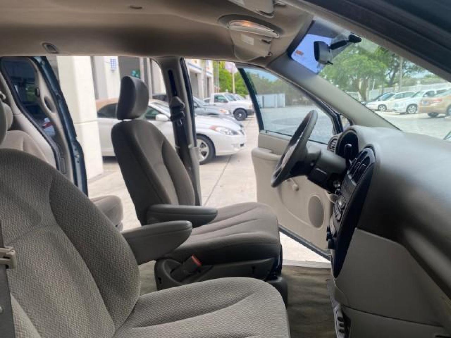 2007 Magnesium Pearl /Medium Slate Gray Dodge Caravan SE 1 OWNER LOW MILES 57,531 (1D4GP25B07B) with an 2.4L DOHC SMPI 16-Valve 4-Cyl Engine engine, Automatic transmission, located at 4701 North Dixie Hwy, Pompano Beach, FL, 33064, (954) 422-2889, 26.240938, -80.123474 - OUR WEBPAGE FLORIDACARS1.COM HAS OVER 100 PHOTOS AND FREE CARFAX LINK 2007 DODGE CARAVAN SE VIN: 1D4GP25B07B182994 1 D 4 G P 2 5 B 0 7 B 1 8 2 9 9 4 VAN 2.4L I4 F DOHC GASOLINE FRONT WHEEL DRIVE Top Features Cloth Seats Third Row Seat Basic Features AM/FM Stereo Air Conditioning Automatic Transmissi - Photo#12