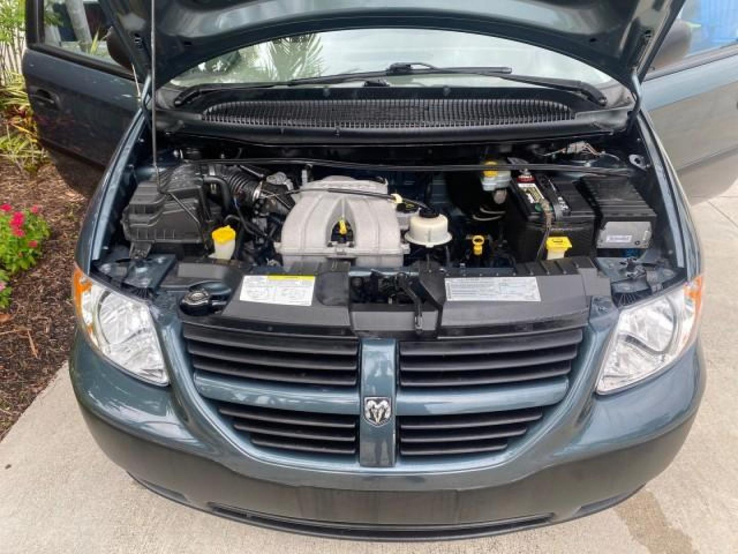 2007 Magnesium Pearl /Medium Slate Gray Dodge Caravan SE 1 OWNER LOW MILES 57,531 (1D4GP25B07B) with an 2.4L DOHC SMPI 16-Valve 4-Cyl Engine engine, Automatic transmission, located at 4701 North Dixie Hwy, Pompano Beach, FL, 33064, (954) 422-2889, 26.240938, -80.123474 - OUR WEBPAGE FLORIDACARS1.COM HAS OVER 100 PHOTOS AND FREE CARFAX LINK 2007 DODGE CARAVAN SE VIN: 1D4GP25B07B182994 1 D 4 G P 2 5 B 0 7 B 1 8 2 9 9 4 VAN 2.4L I4 F DOHC GASOLINE FRONT WHEEL DRIVE Top Features Cloth Seats Third Row Seat Basic Features AM/FM Stereo Air Conditioning Automatic Transmissi - Photo#17