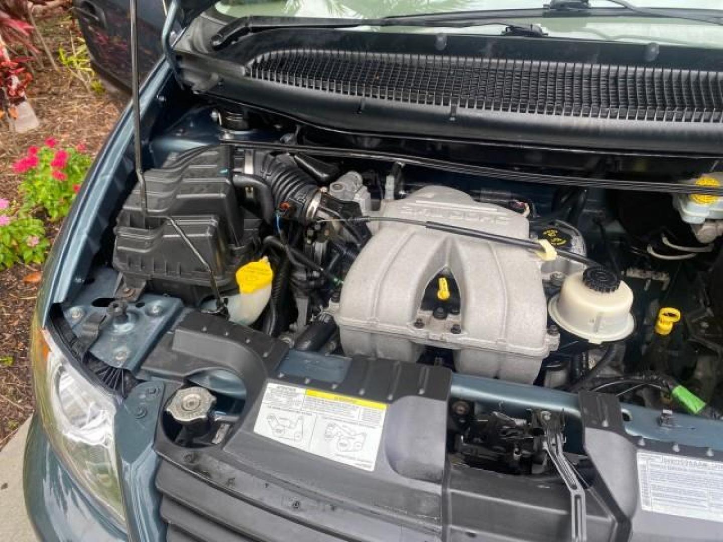2007 Magnesium Pearl /Medium Slate Gray Dodge Caravan SE 1 OWNER LOW MILES 57,531 (1D4GP25B07B) with an 2.4L DOHC SMPI 16-Valve 4-Cyl Engine engine, Automatic transmission, located at 4701 North Dixie Hwy, Pompano Beach, FL, 33064, (954) 422-2889, 26.240938, -80.123474 - OUR WEBPAGE FLORIDACARS1.COM HAS OVER 100 PHOTOS AND FREE CARFAX LINK 2007 DODGE CARAVAN SE VIN: 1D4GP25B07B182994 1 D 4 G P 2 5 B 0 7 B 1 8 2 9 9 4 VAN 2.4L I4 F DOHC GASOLINE FRONT WHEEL DRIVE Top Features Cloth Seats Third Row Seat Basic Features AM/FM Stereo Air Conditioning Automatic Transmissi - Photo#25