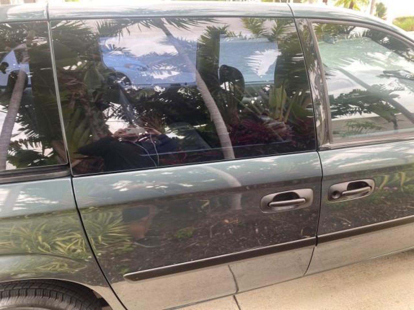2007 Magnesium Pearl /Medium Slate Gray Dodge Caravan SE 1 OWNER LOW MILES 57,531 (1D4GP25B07B) with an 2.4L DOHC SMPI 16-Valve 4-Cyl Engine engine, Automatic transmission, located at 4701 North Dixie Hwy, Pompano Beach, FL, 33064, (954) 422-2889, 26.240938, -80.123474 - OUR WEBPAGE FLORIDACARS1.COM HAS OVER 100 PHOTOS AND FREE CARFAX LINK 2007 DODGE CARAVAN SE VIN: 1D4GP25B07B182994 1 D 4 G P 2 5 B 0 7 B 1 8 2 9 9 4 VAN 2.4L I4 F DOHC GASOLINE FRONT WHEEL DRIVE Top Features Cloth Seats Third Row Seat Basic Features AM/FM Stereo Air Conditioning Automatic Transmissi - Photo#86