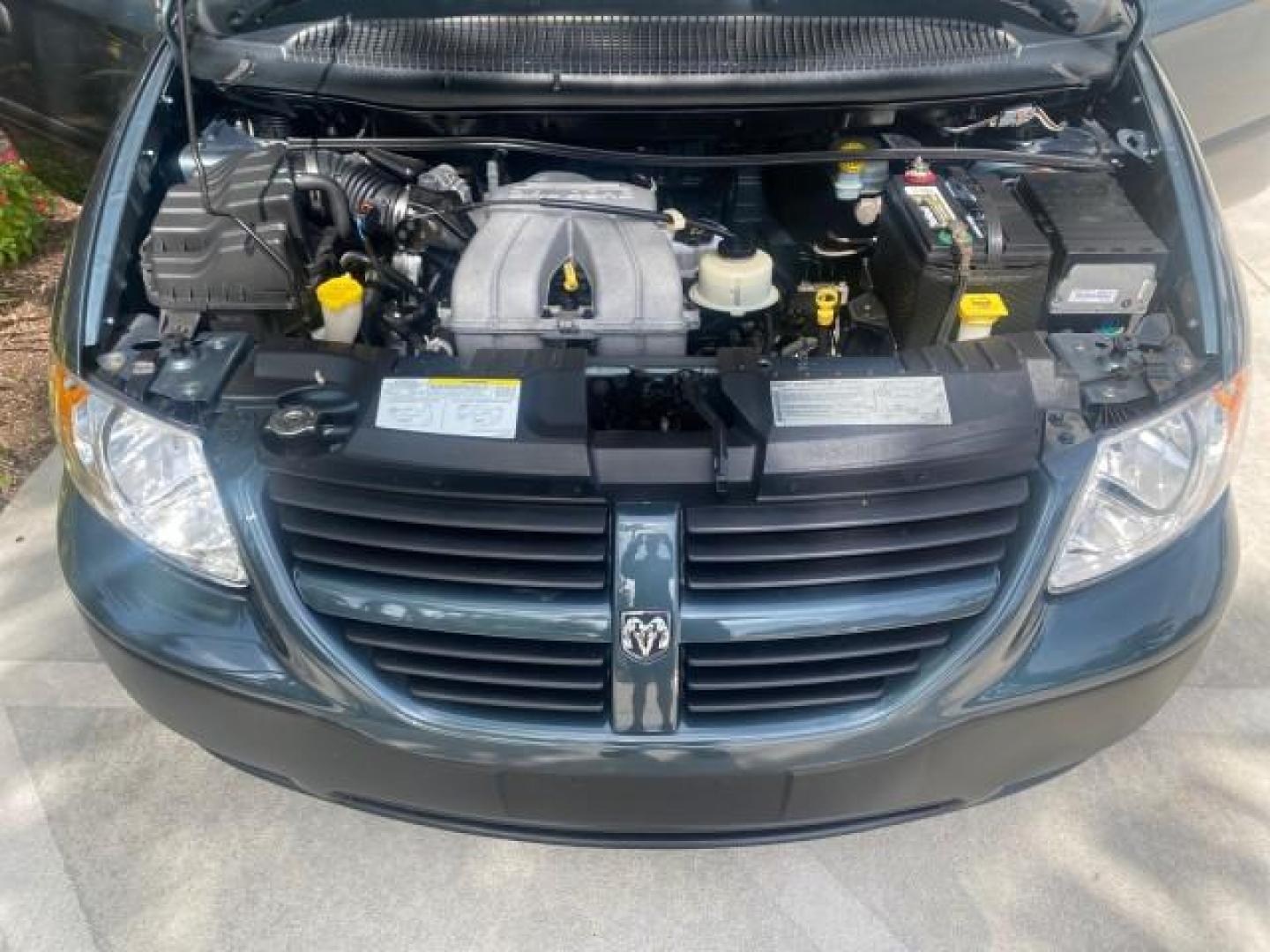2007 Magnesium Pearl /Medium Slate Gray Dodge Caravan SE 1 OWNER LOW MILES 57,531 (1D4GP25B07B) with an 2.4L DOHC SMPI 16-Valve 4-Cyl Engine engine, Automatic transmission, located at 4701 North Dixie Hwy, Pompano Beach, FL, 33064, (954) 422-2889, 26.240938, -80.123474 - OUR WEBPAGE FLORIDACARS1.COM HAS OVER 100 PHOTOS AND FREE CARFAX LINK 2007 DODGE CARAVAN SE VIN: 1D4GP25B07B182994 1 D 4 G P 2 5 B 0 7 B 1 8 2 9 9 4 VAN 2.4L I4 F DOHC GASOLINE FRONT WHEEL DRIVE Top Features Cloth Seats Third Row Seat Basic Features AM/FM Stereo Air Conditioning Automatic Transmissi - Photo#17