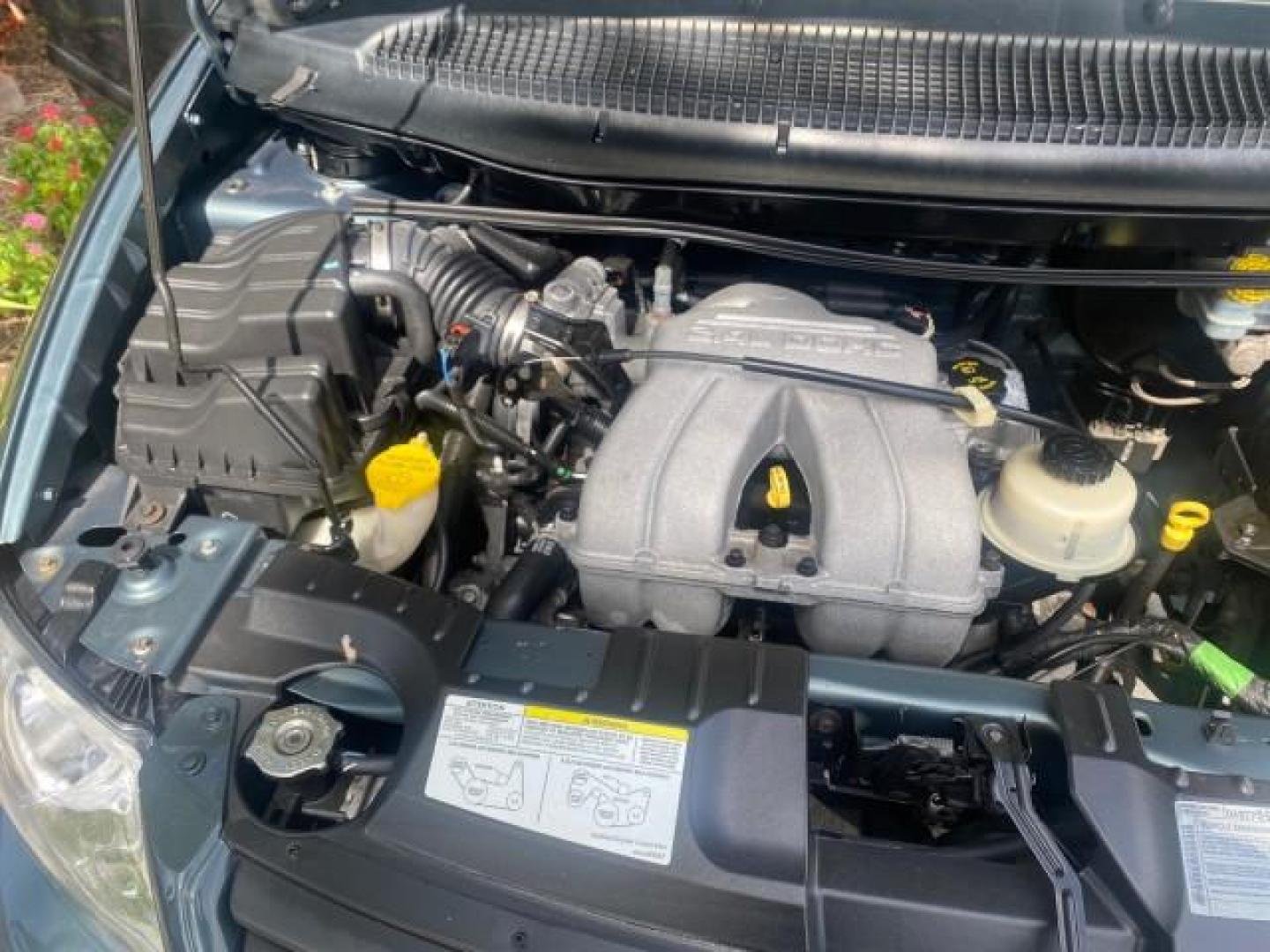 2007 Magnesium Pearl /Medium Slate Gray Dodge Caravan SE 1 OWNER LOW MILES 57,531 (1D4GP25B07B) with an 2.4L DOHC SMPI 16-Valve 4-Cyl Engine engine, Automatic transmission, located at 4701 North Dixie Hwy, Pompano Beach, FL, 33064, (954) 422-2889, 26.240938, -80.123474 - OUR WEBPAGE FLORIDACARS1.COM HAS OVER 100 PHOTOS AND FREE CARFAX LINK 2007 DODGE CARAVAN SE VIN: 1D4GP25B07B182994 1 D 4 G P 2 5 B 0 7 B 1 8 2 9 9 4 VAN 2.4L I4 F DOHC GASOLINE FRONT WHEEL DRIVE Top Features Cloth Seats Third Row Seat Basic Features AM/FM Stereo Air Conditioning Automatic Transmissi - Photo#25