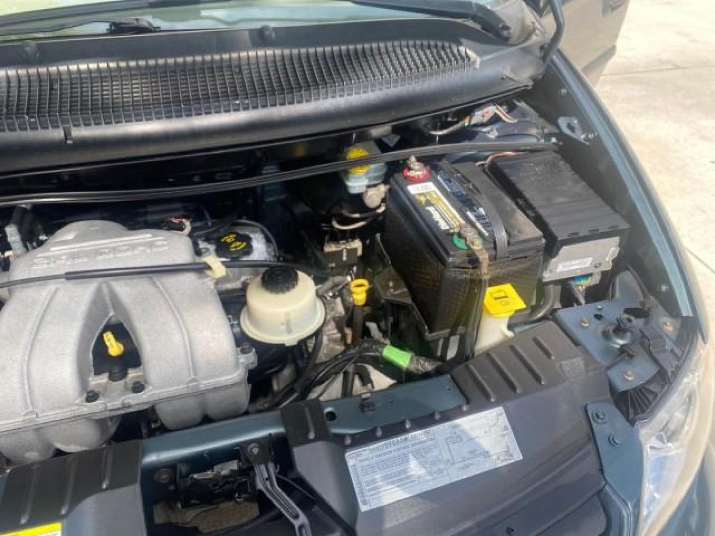 2007 Magnesium Pearl /Medium Slate Gray Dodge Caravan SE 1 OWNER LOW MILES 57,531 (1D4GP25B07B) with an 2.4L DOHC SMPI 16-Valve 4-Cyl Engine engine, Automatic transmission, located at 4701 North Dixie Hwy, Pompano Beach, FL, 33064, (954) 422-2889, 26.240938, -80.123474 - OUR WEBPAGE FLORIDACARS1.COM HAS OVER 100 PHOTOS AND FREE CARFAX LINK 2007 DODGE CARAVAN SE VIN: 1D4GP25B07B182994 1 D 4 G P 2 5 B 0 7 B 1 8 2 9 9 4 VAN 2.4L I4 F DOHC GASOLINE FRONT WHEEL DRIVE Top Features Cloth Seats Third Row Seat Basic Features AM/FM Stereo Air Conditioning Automatic Transmissi - Photo#26