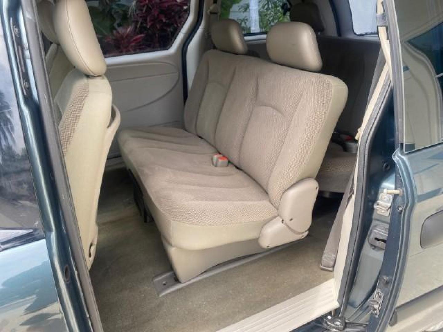 2007 Magnesium Pearl /Medium Slate Gray Dodge Caravan SE 1 OWNER LOW MILES 57,531 (1D4GP25B07B) with an 2.4L DOHC SMPI 16-Valve 4-Cyl Engine engine, Automatic transmission, located at 4701 North Dixie Hwy, Pompano Beach, FL, 33064, (954) 422-2889, 26.240938, -80.123474 - OUR WEBPAGE FLORIDACARS1.COM HAS OVER 100 PHOTOS AND FREE CARFAX LINK 2007 DODGE CARAVAN SE VIN: 1D4GP25B07B182994 1 D 4 G P 2 5 B 0 7 B 1 8 2 9 9 4 VAN 2.4L I4 F DOHC GASOLINE FRONT WHEEL DRIVE Top Features Cloth Seats Third Row Seat Basic Features AM/FM Stereo Air Conditioning Automatic Transmissi - Photo#58